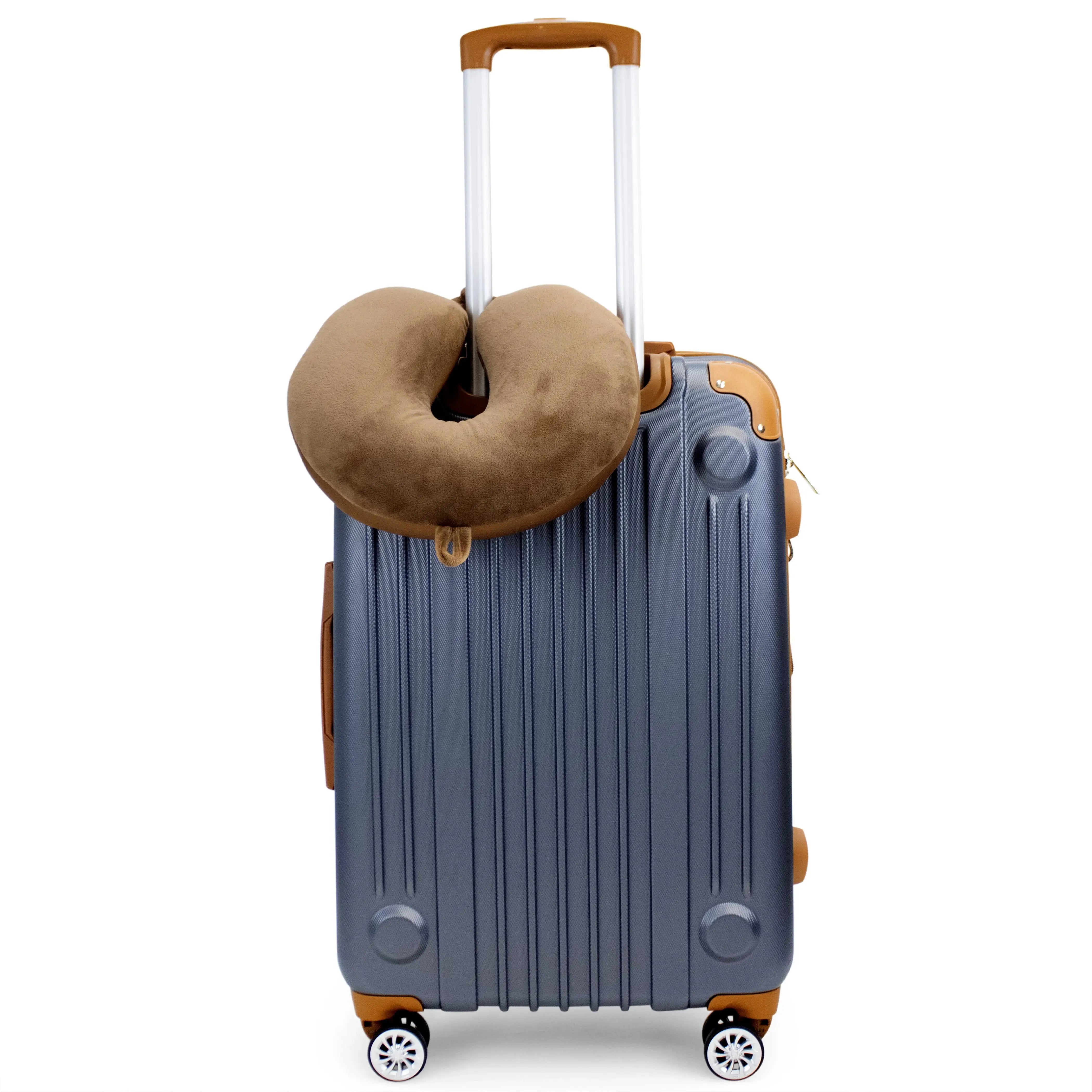 Blue suitcase with a brown travel pillow on a white background