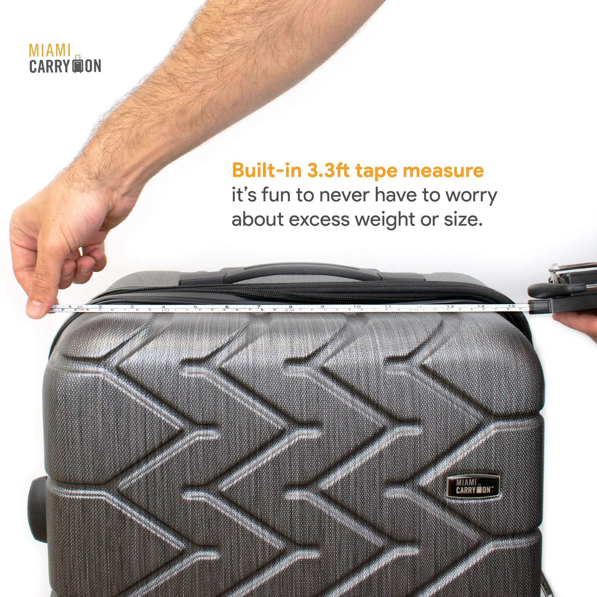 Gray suitcase with a built-in tape measure feature, labeled 'MIAMI CARRY-ON'.