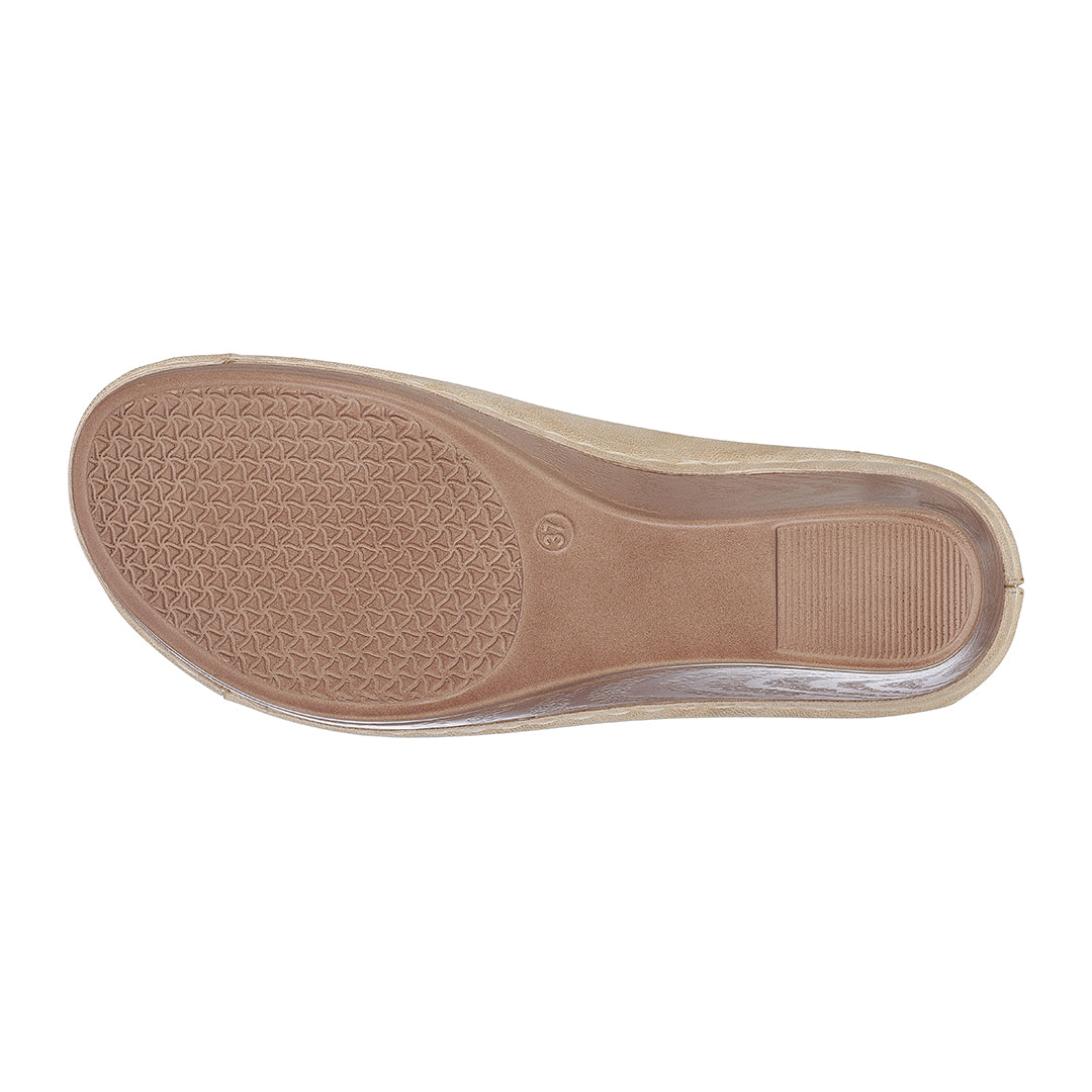 Tan shoe sole on a white background