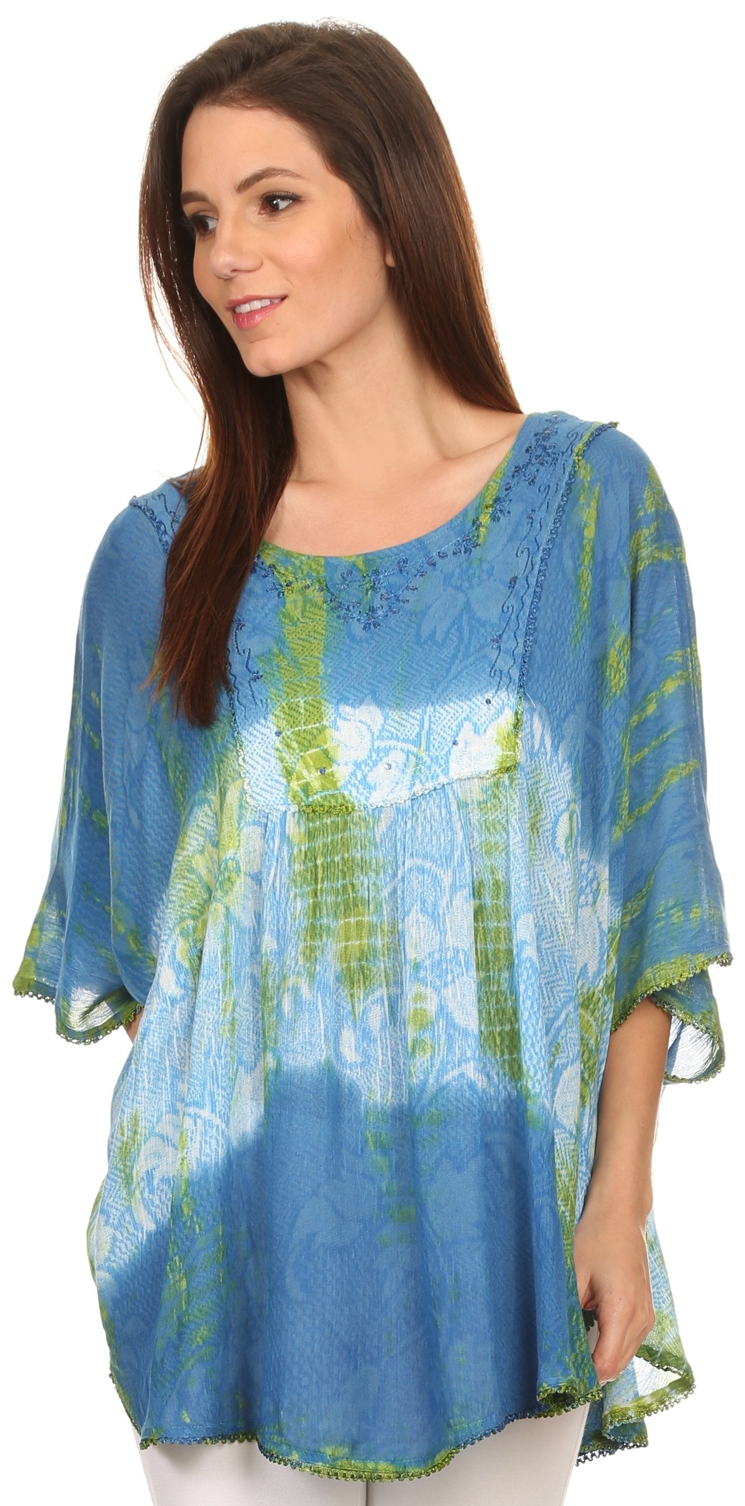 Woman wearing a blue and green patterned blouse on a white background