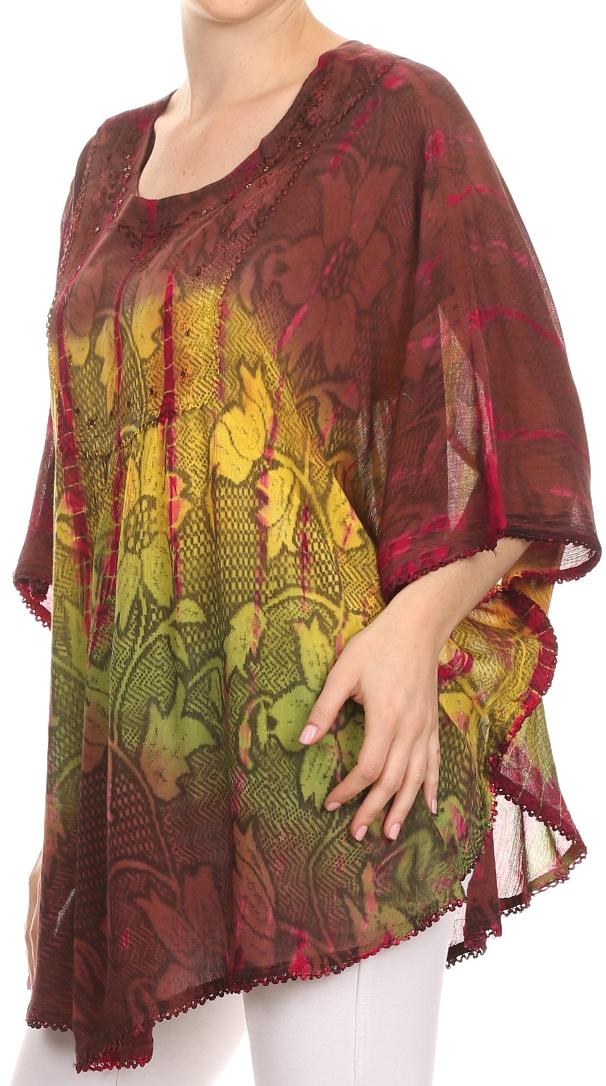 Woman wearing a patterned blouse with a white background
