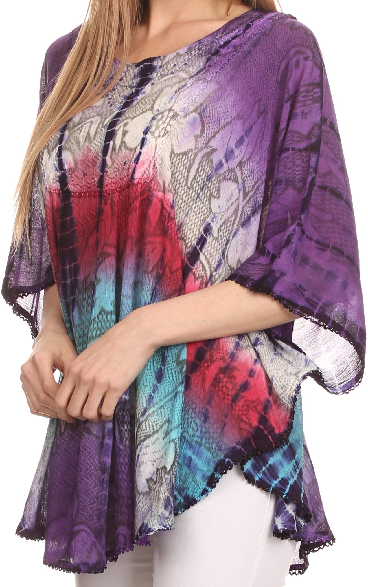 Multicolored patterned top worn by a model on a white background
