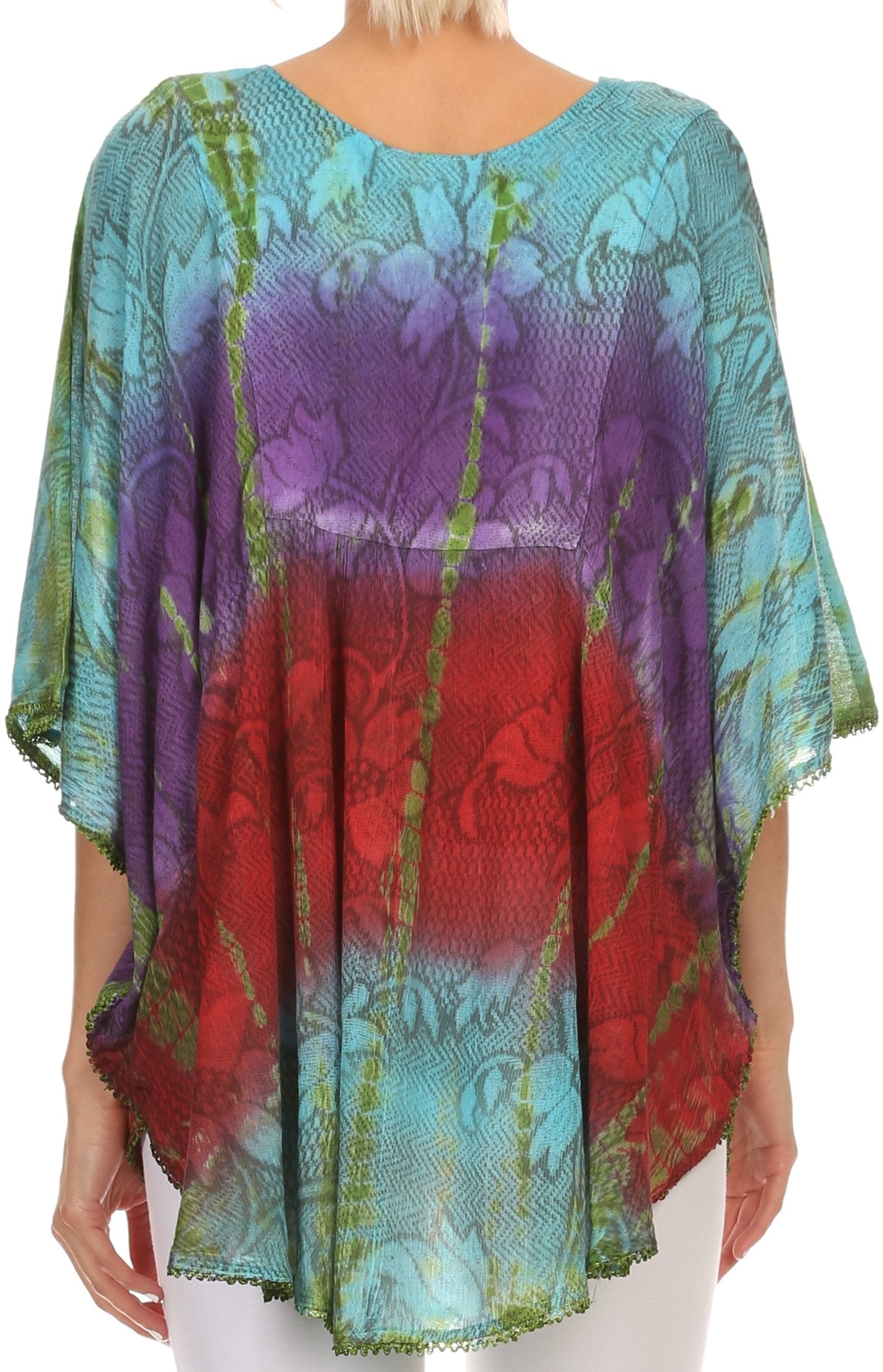 Colorful patterned top worn by a person on a white background