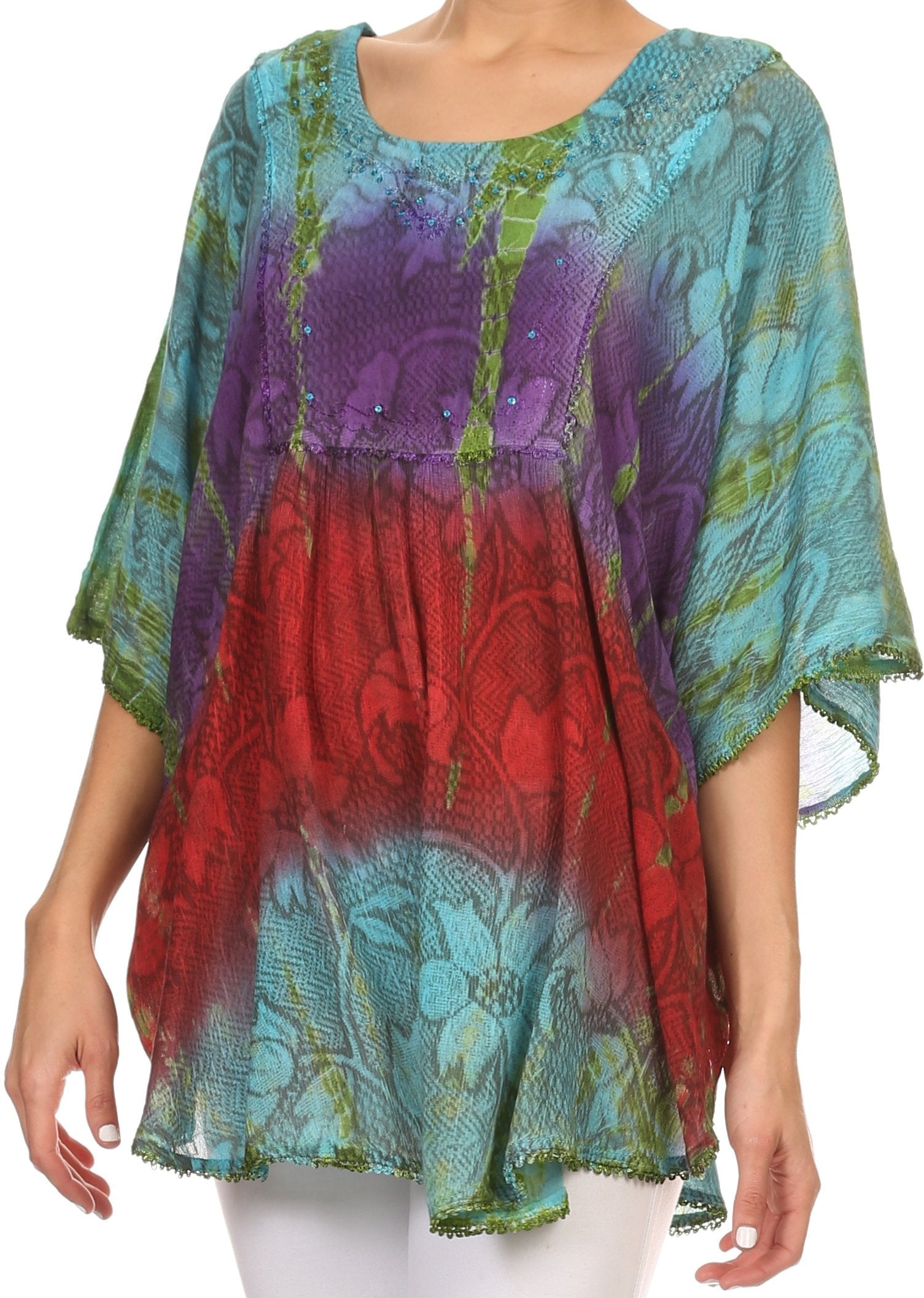 Colorful tie-dye top worn by a person on a white background