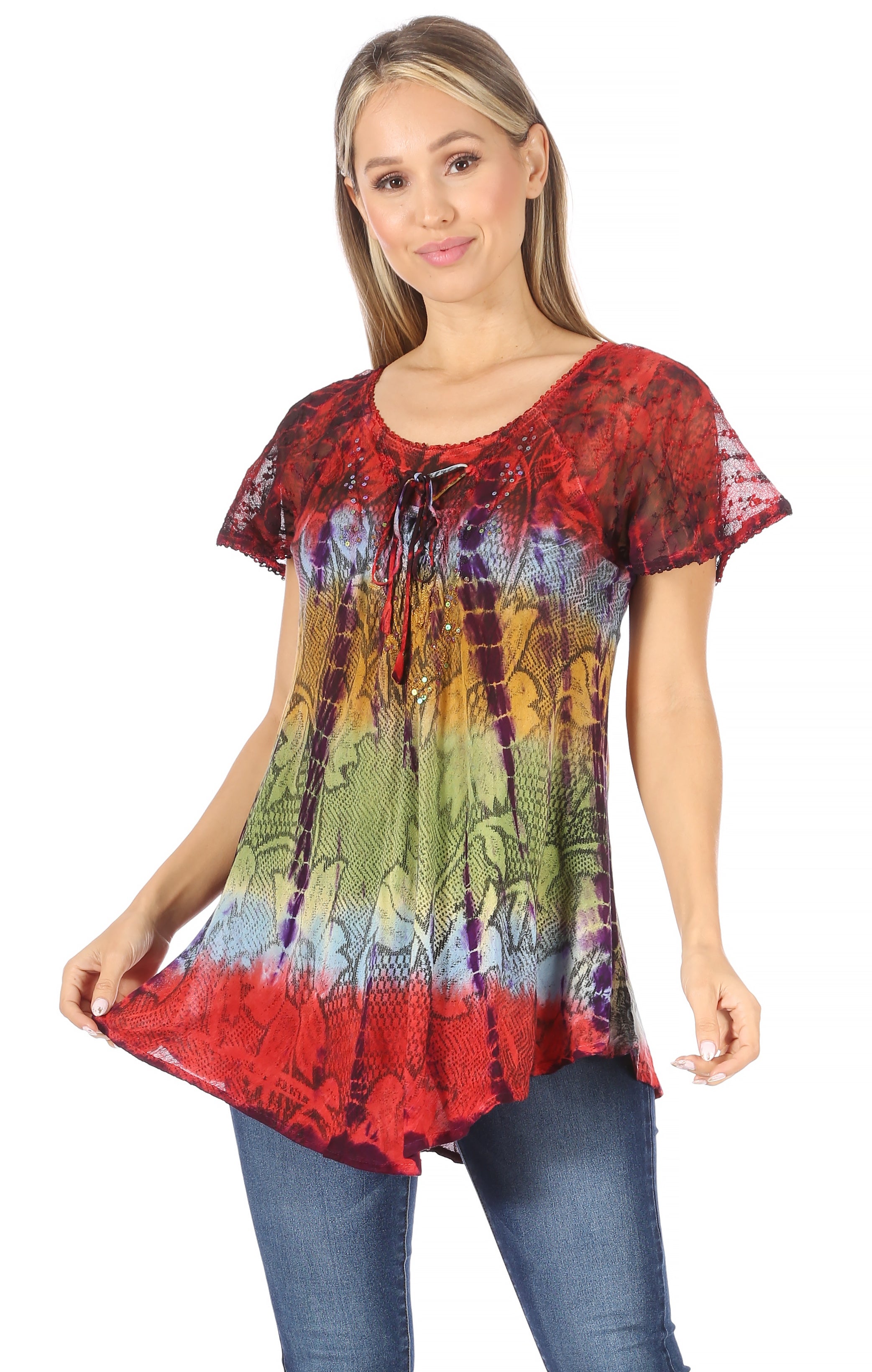 Woman wearing a colorful tie-dye shirt with a white background