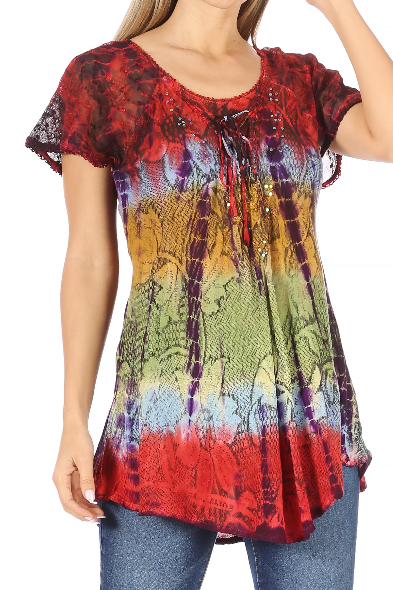 Multicolored patterned top worn by a person on a white background