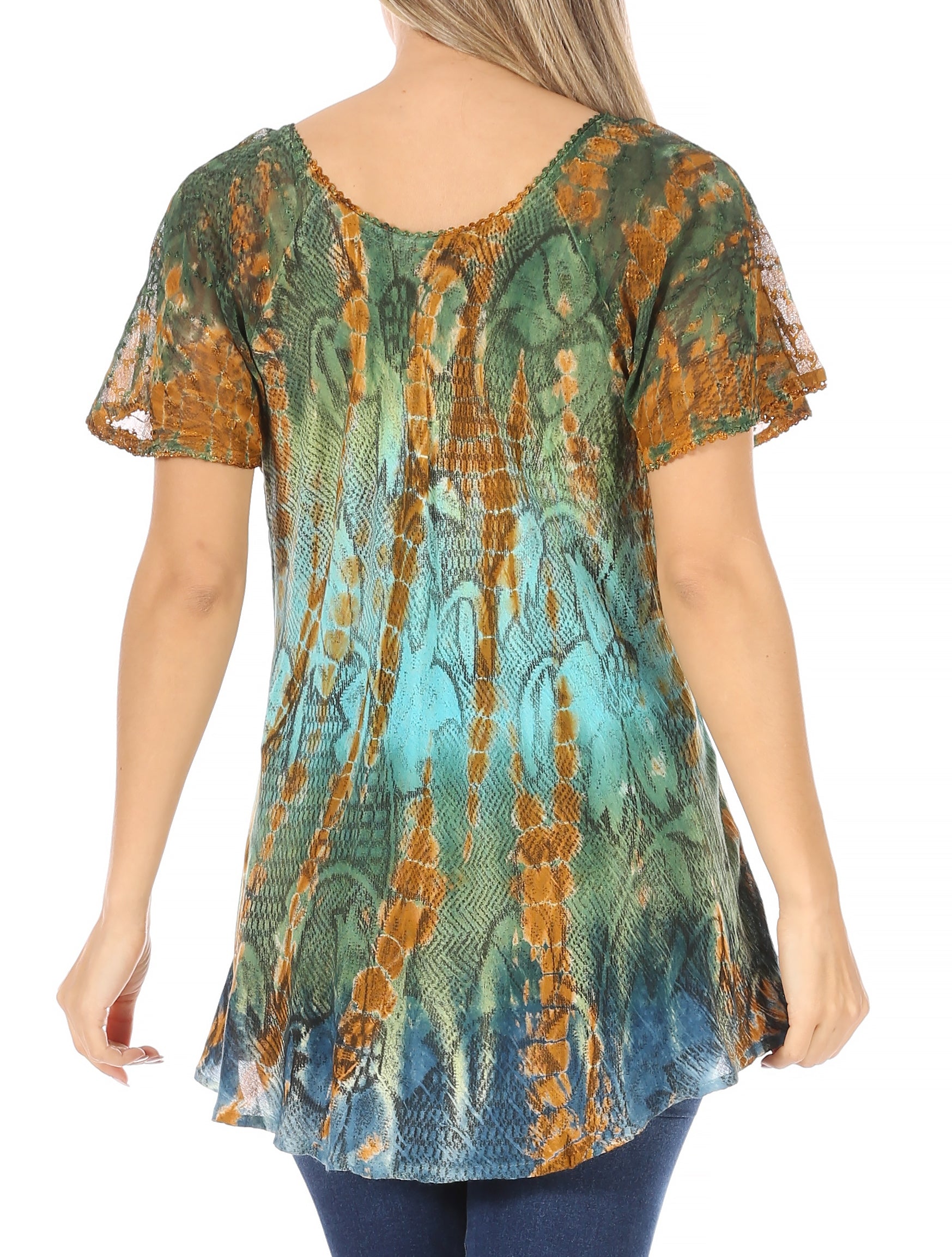 Woman wearing a colorful patterned top on a white background
