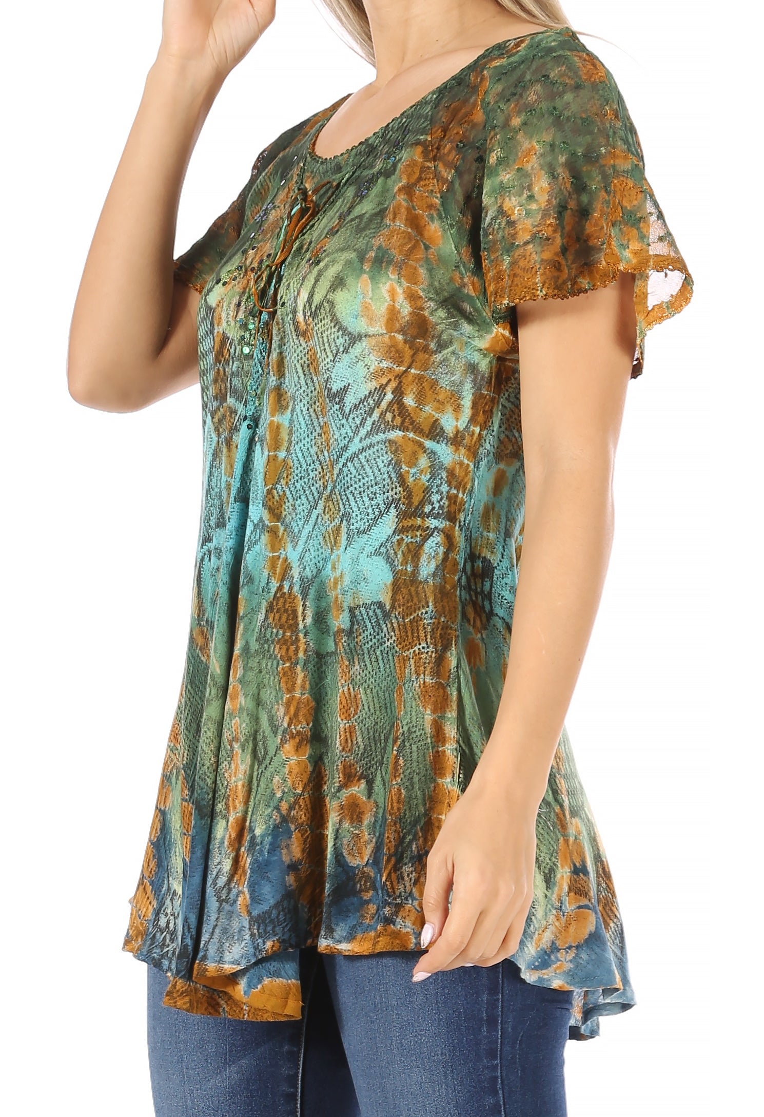 Woman wearing a patterned top with short sleeves on a white background