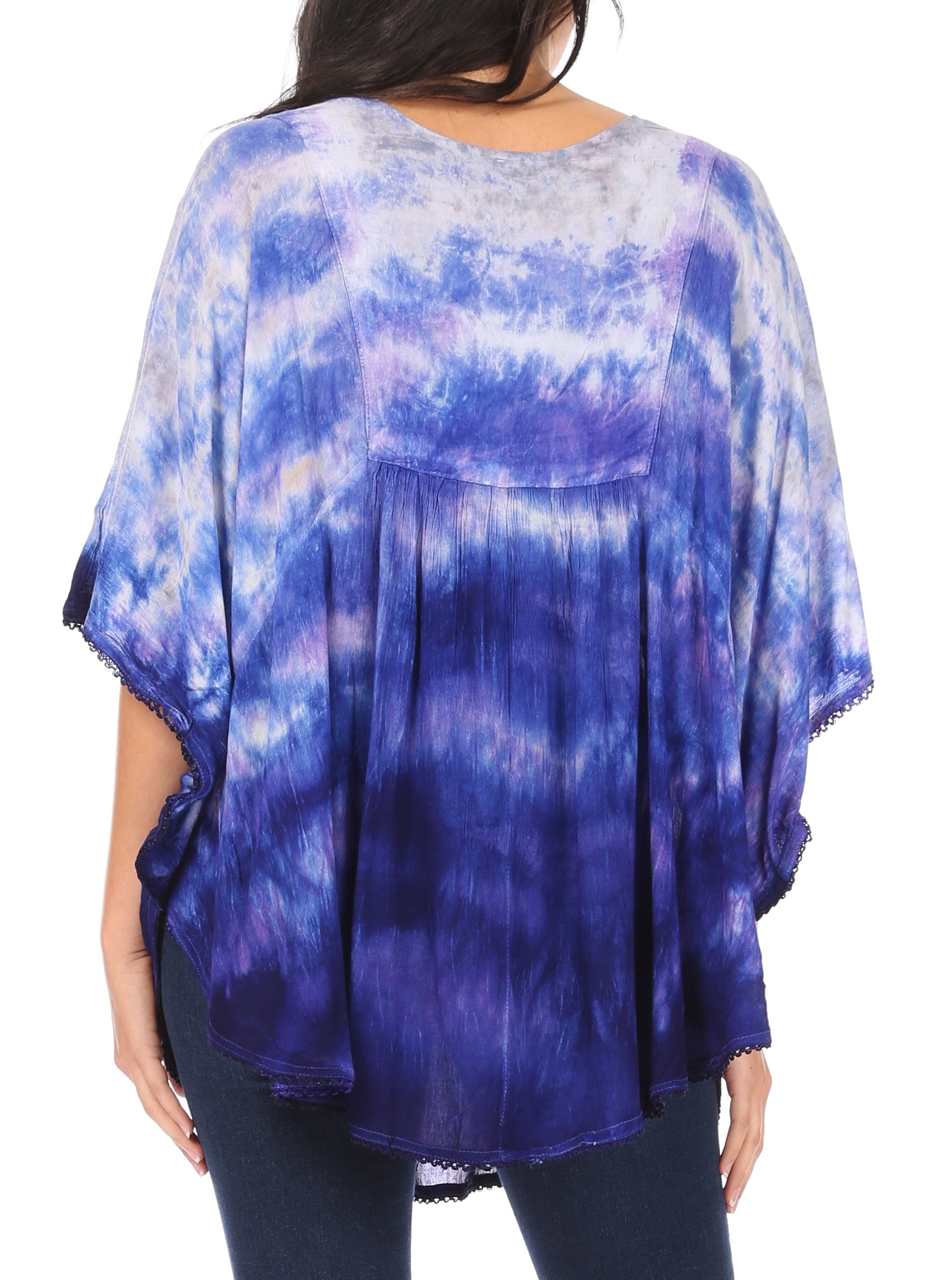 Blue and purple tie-dye top worn by a person on a white background
