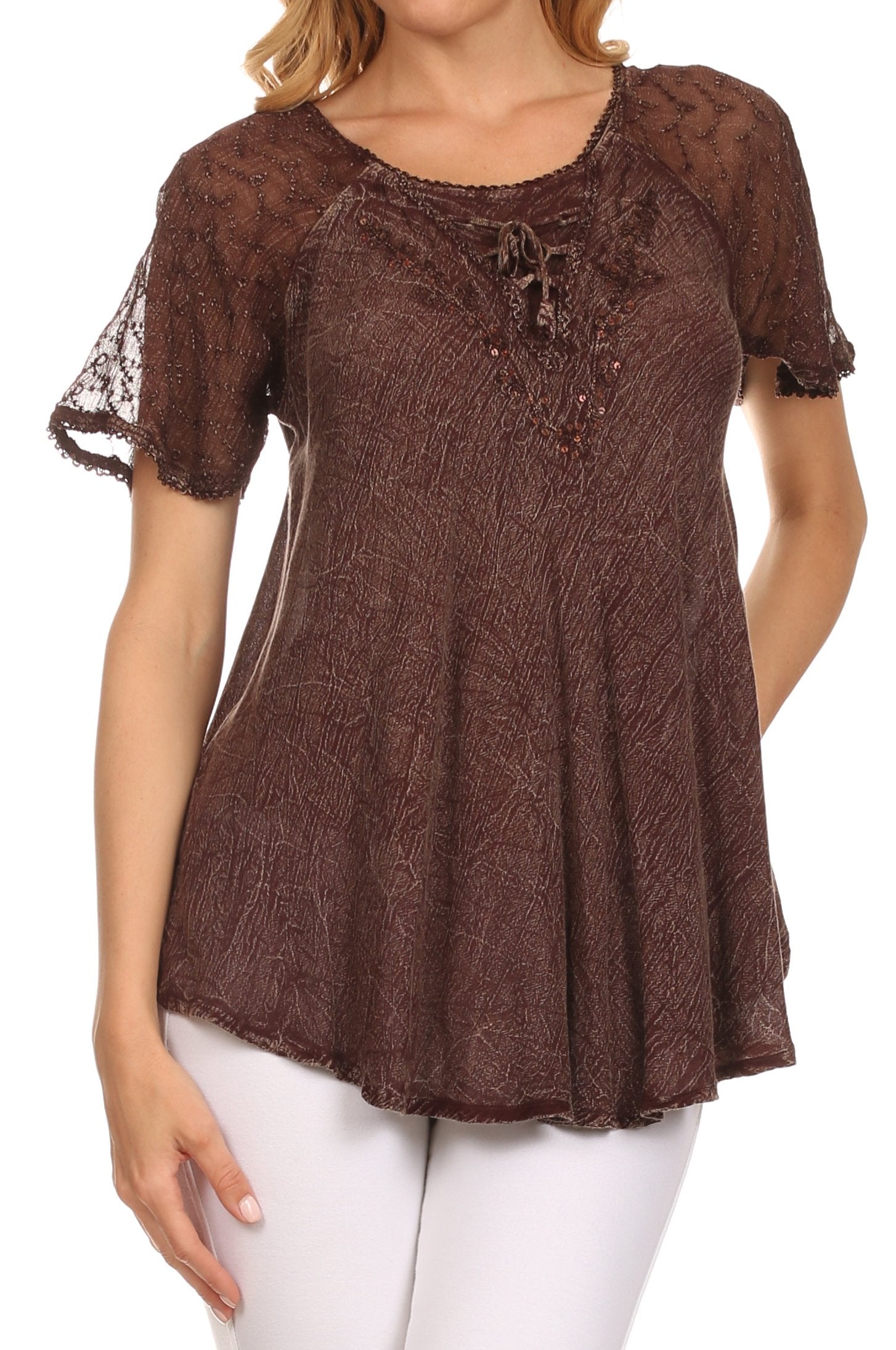 Brown lace top worn by a model on a white background