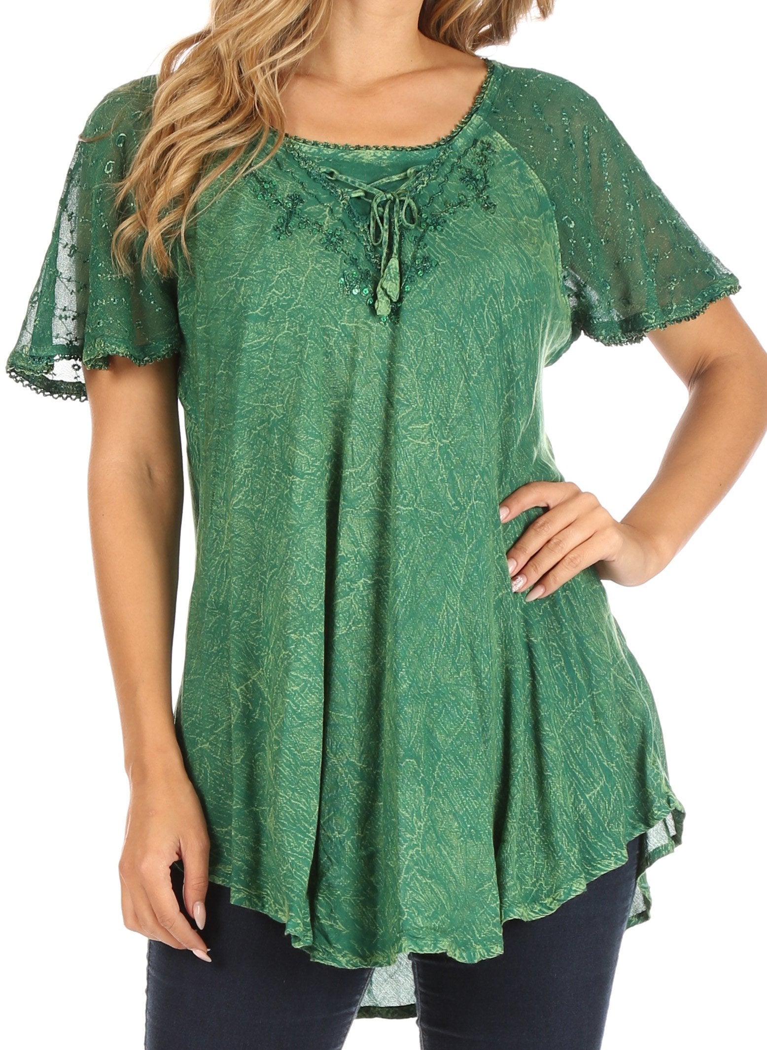 Green lace-up top worn by a model on a white background