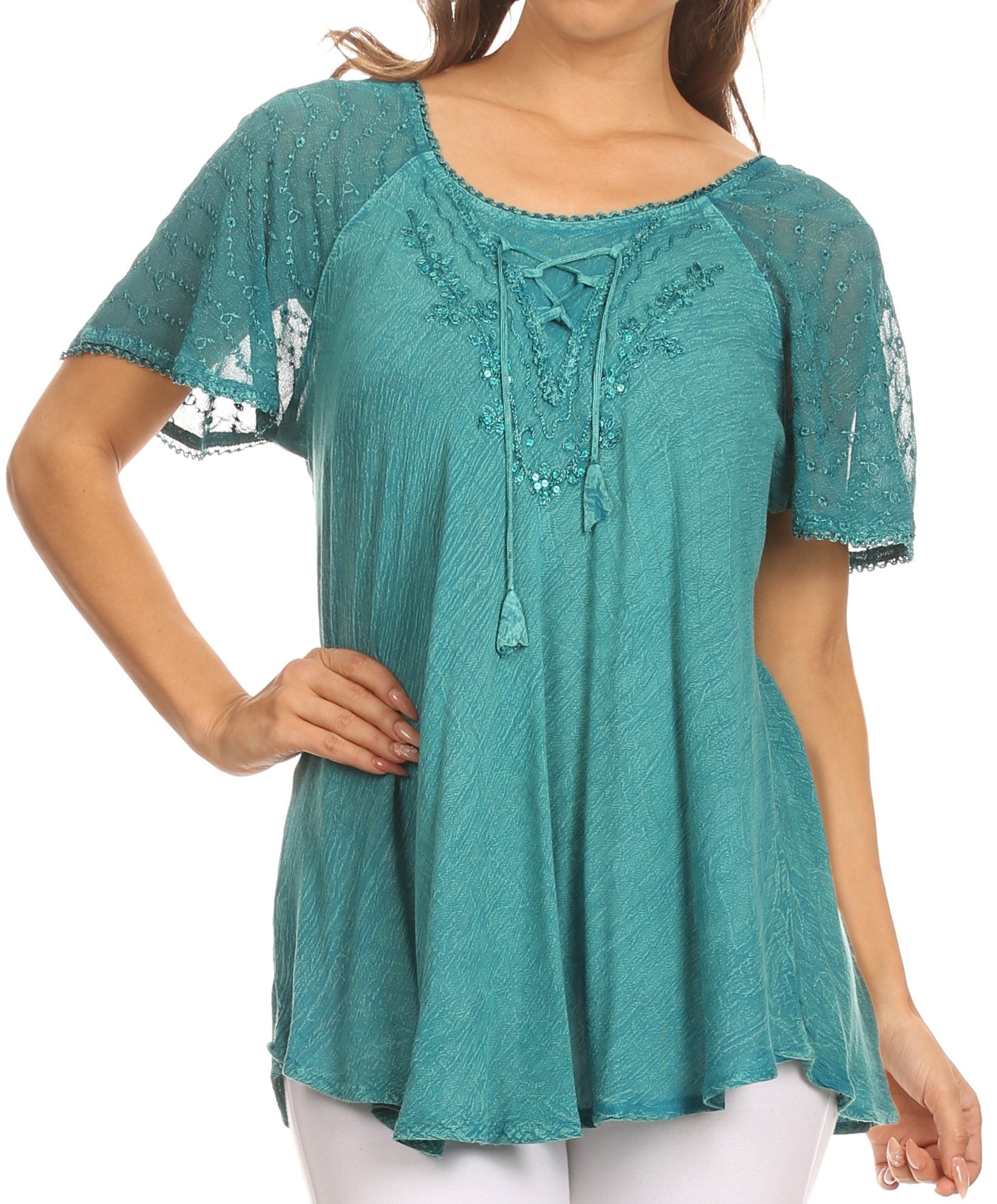 Teal lace top worn by a model on a white background