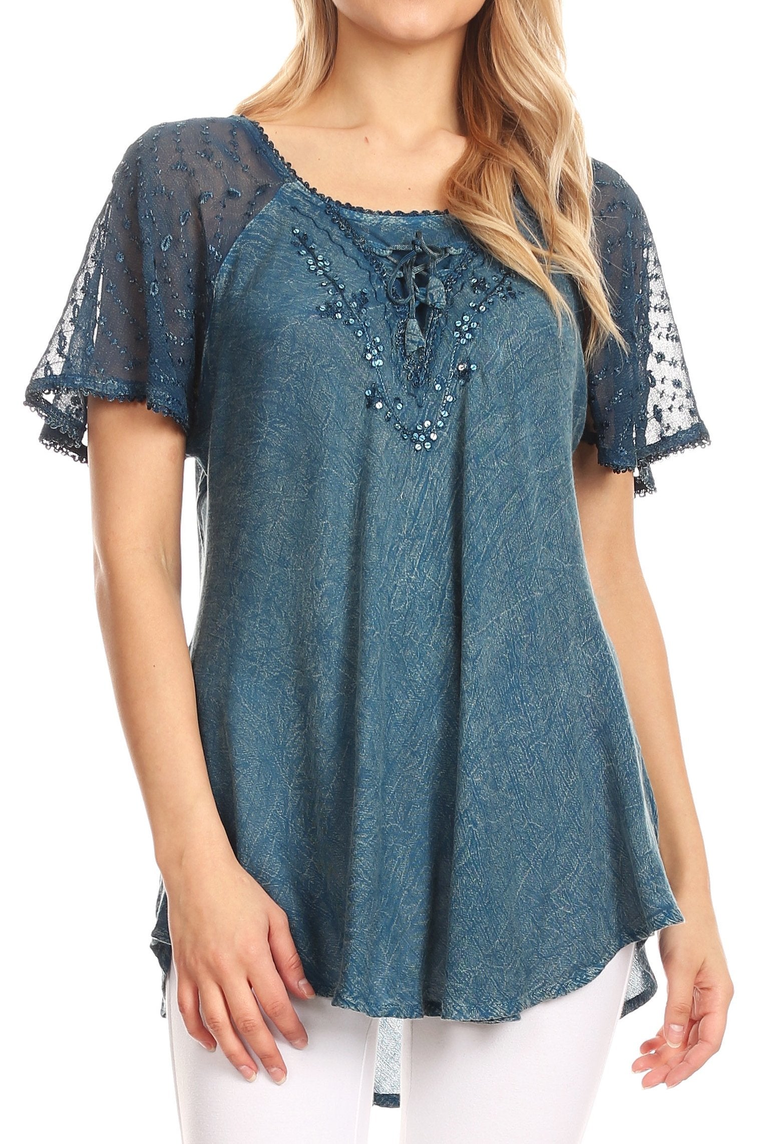 Blue lace top worn by a model on a white background