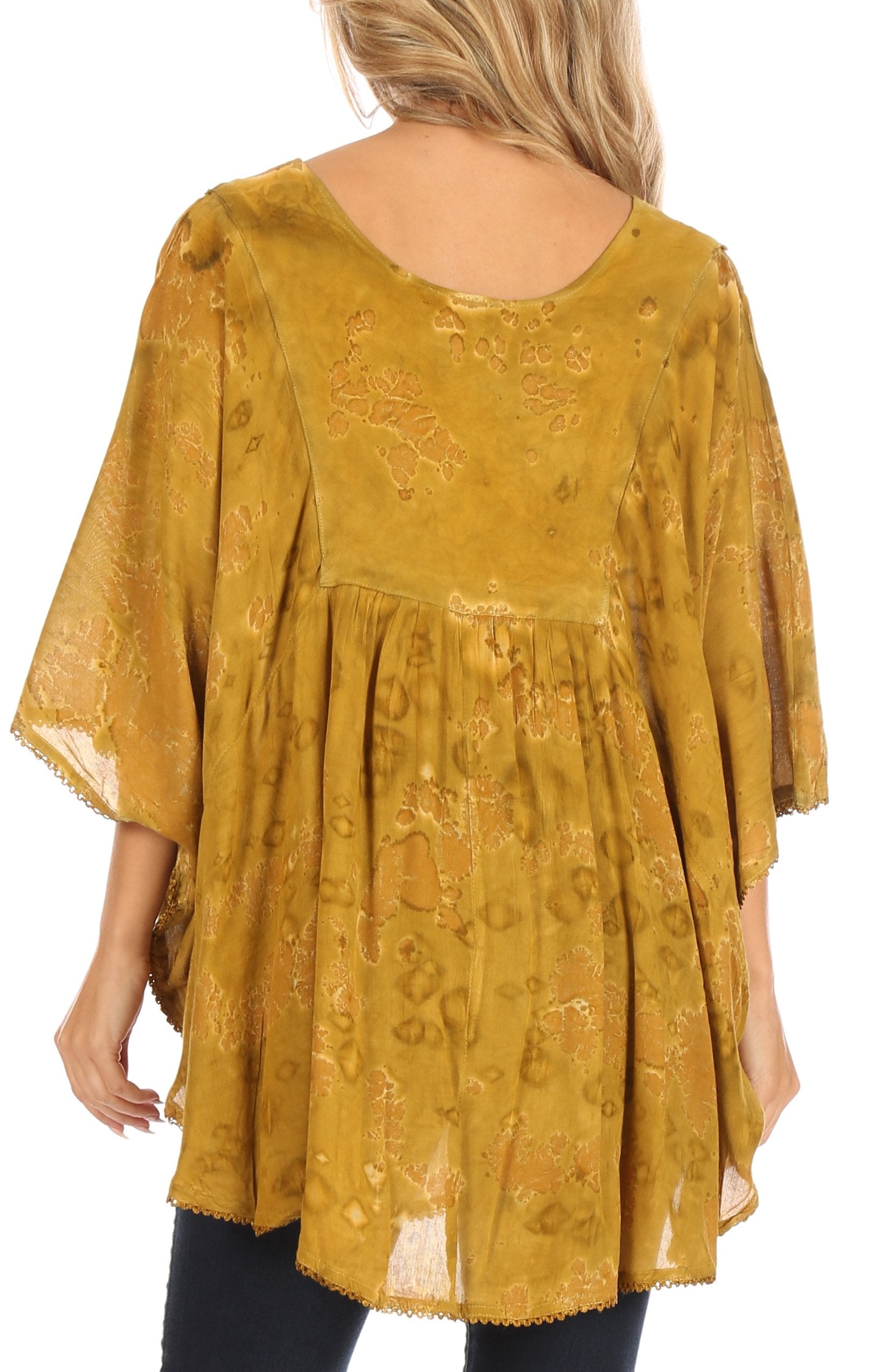 Mustard yellow lace top worn by a person on a white background
