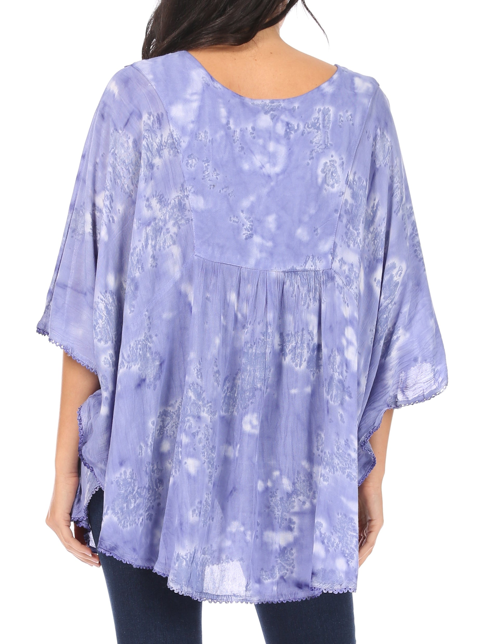 Light purple tie-dye blouse worn by a person on a white background
