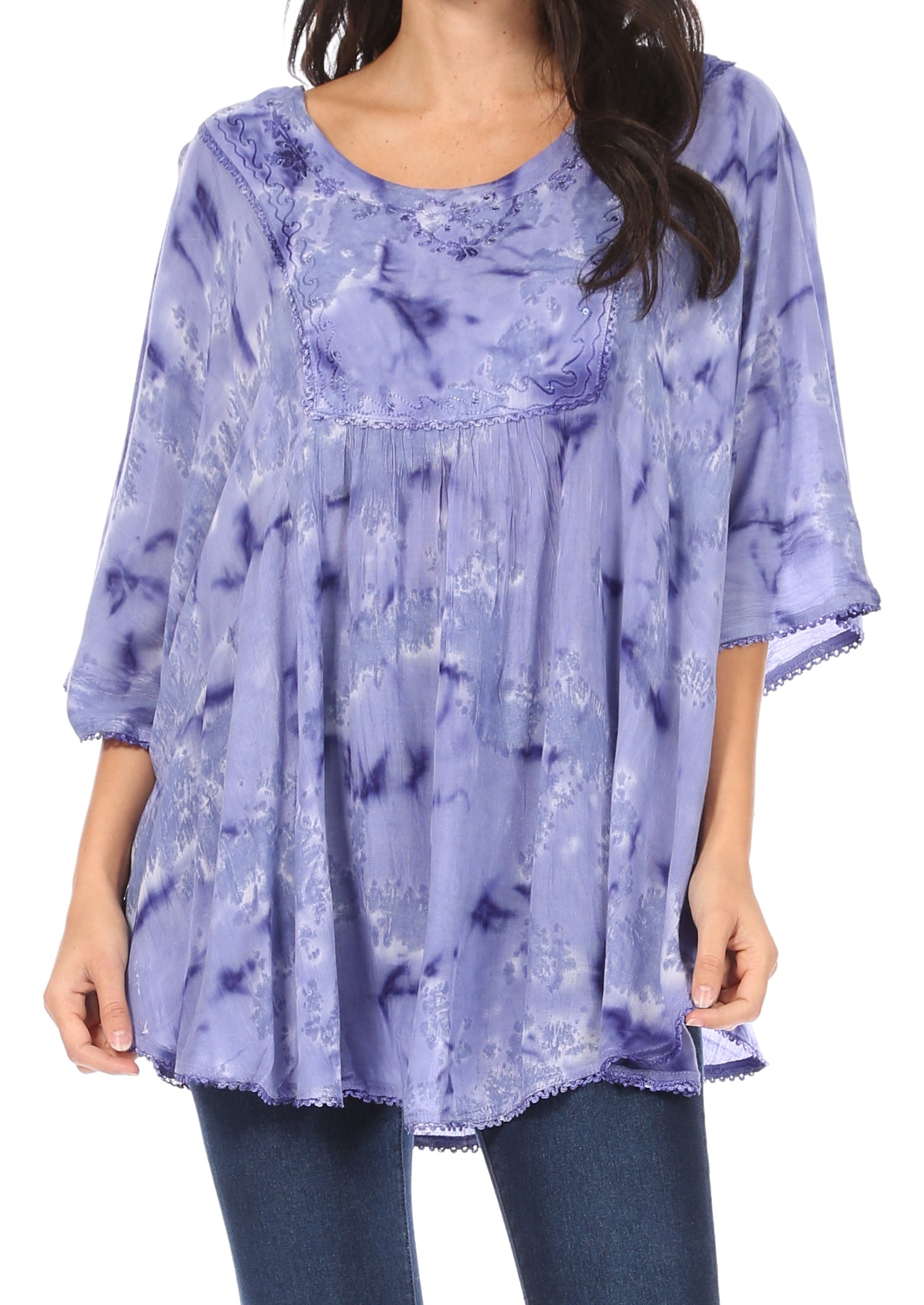Purple tie-dye blouse worn by a person on a white background