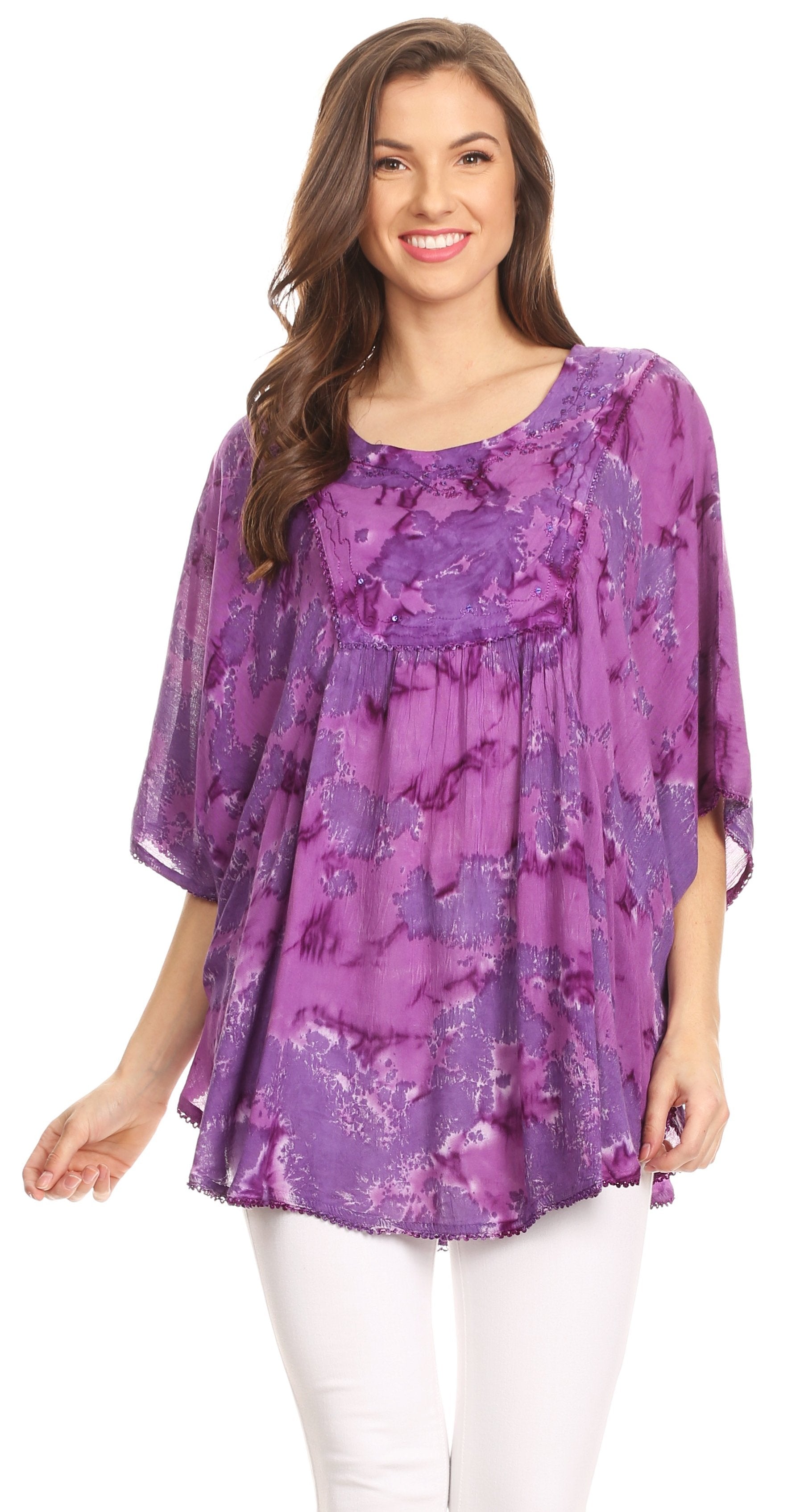 Woman wearing a purple floral blouse on a white background