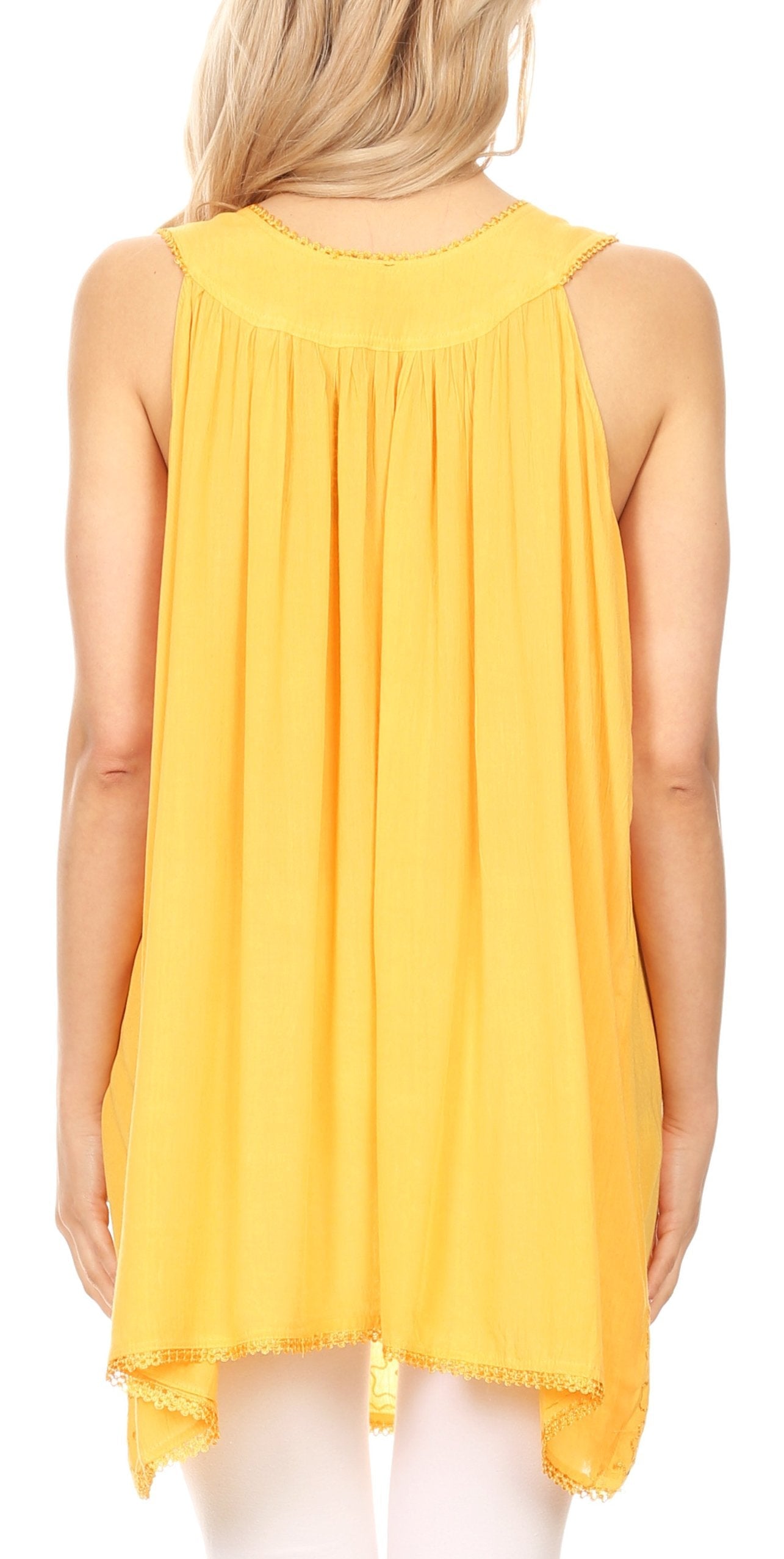 Yellow sleeveless dress worn by a model on a white background