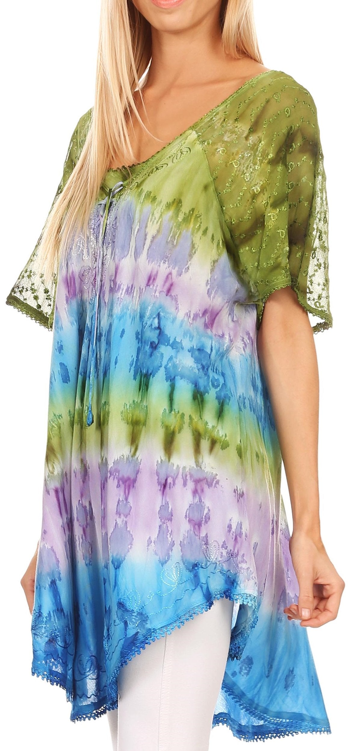 Woman wearing a colorful tie-dye top with a sheer overlay