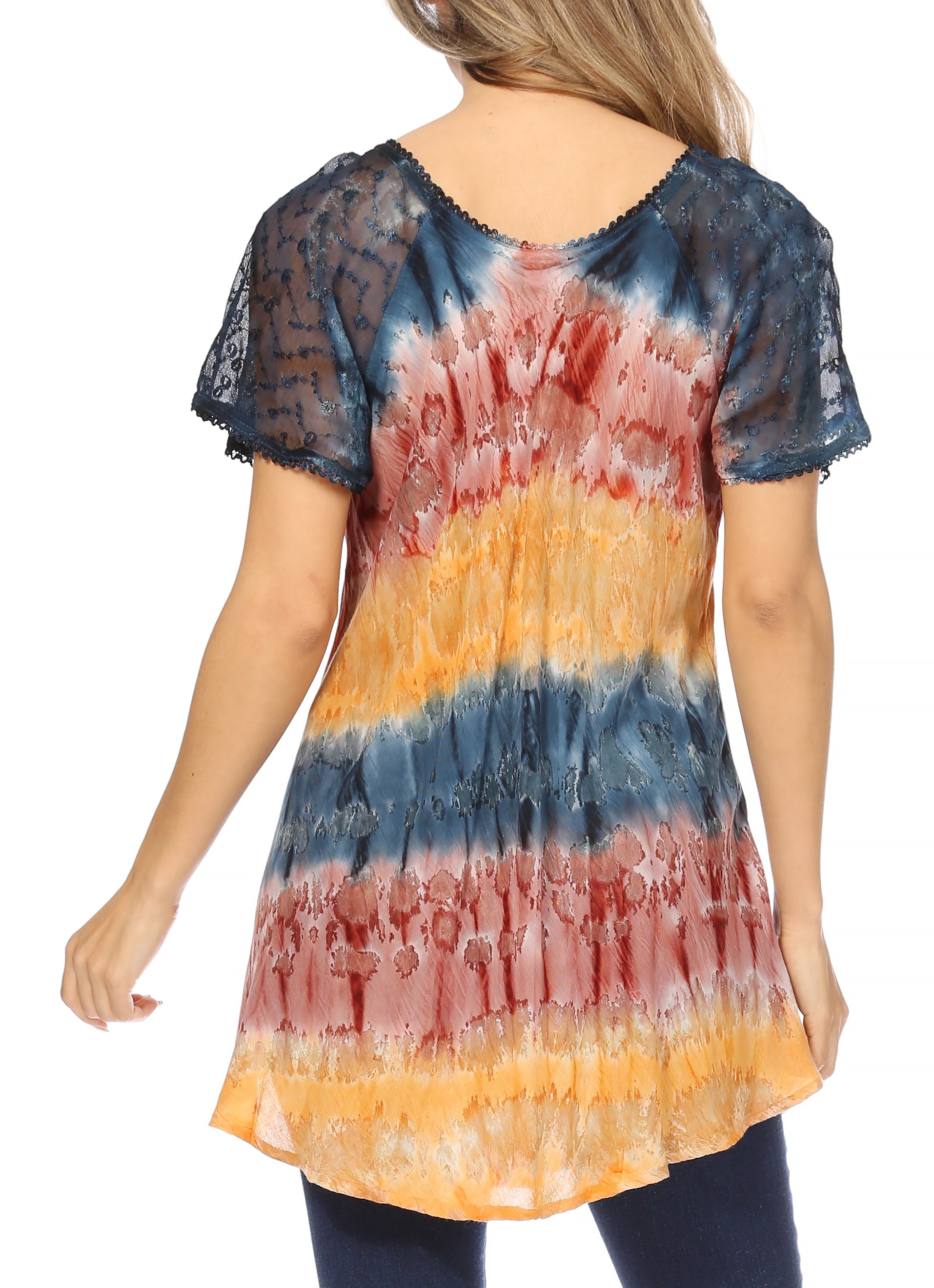 Woman wearing a tie-dye shirt with a colorful pattern on a white background