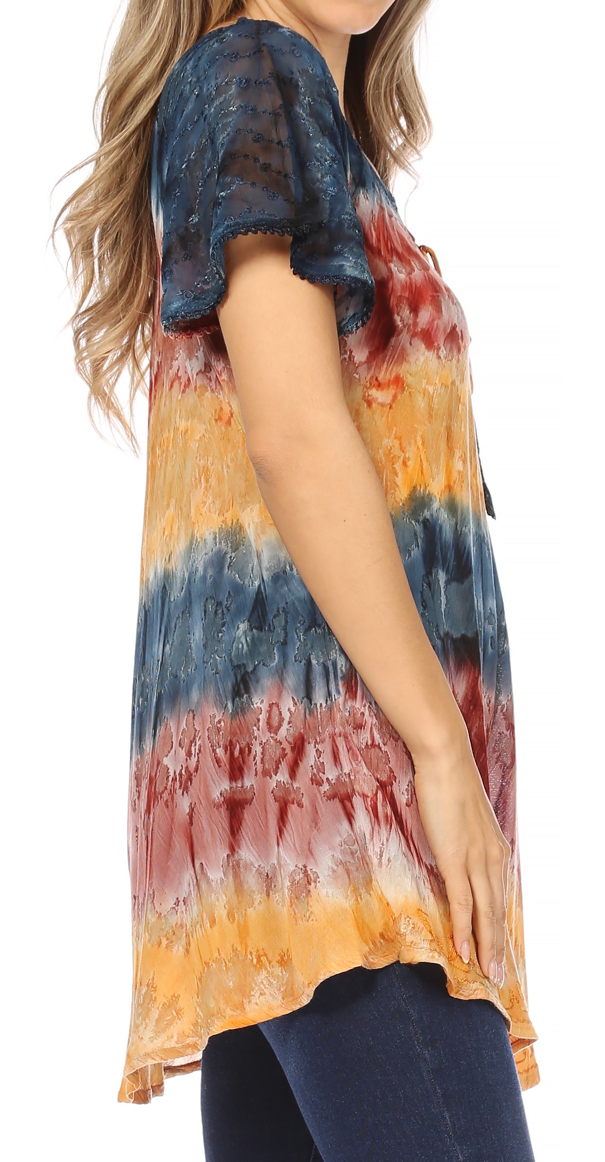 Multicolored tie-dye shirt worn by a person on a white background
