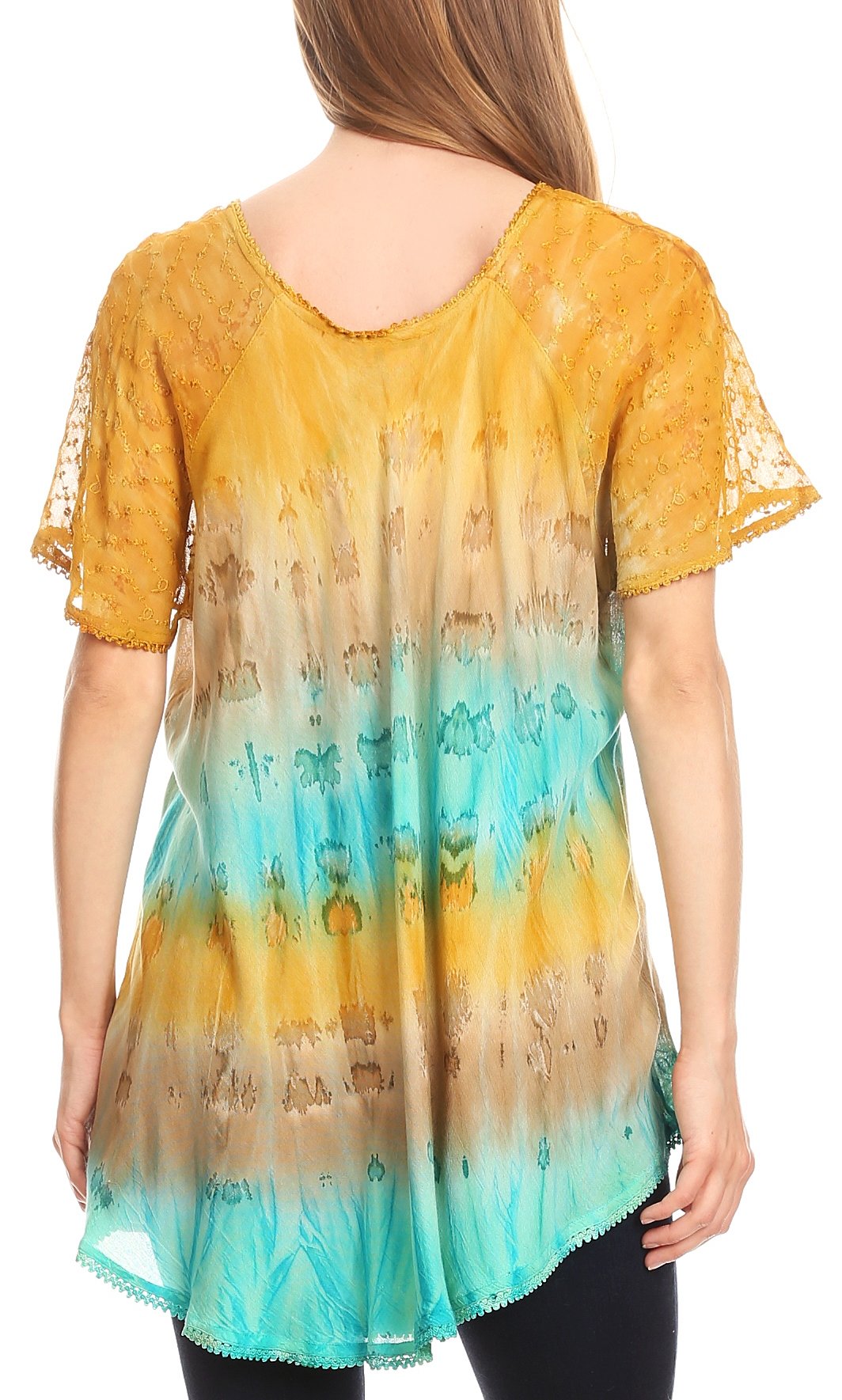 Woman wearing a colorful tie-dye shirt with a gradient from yellow to blue.