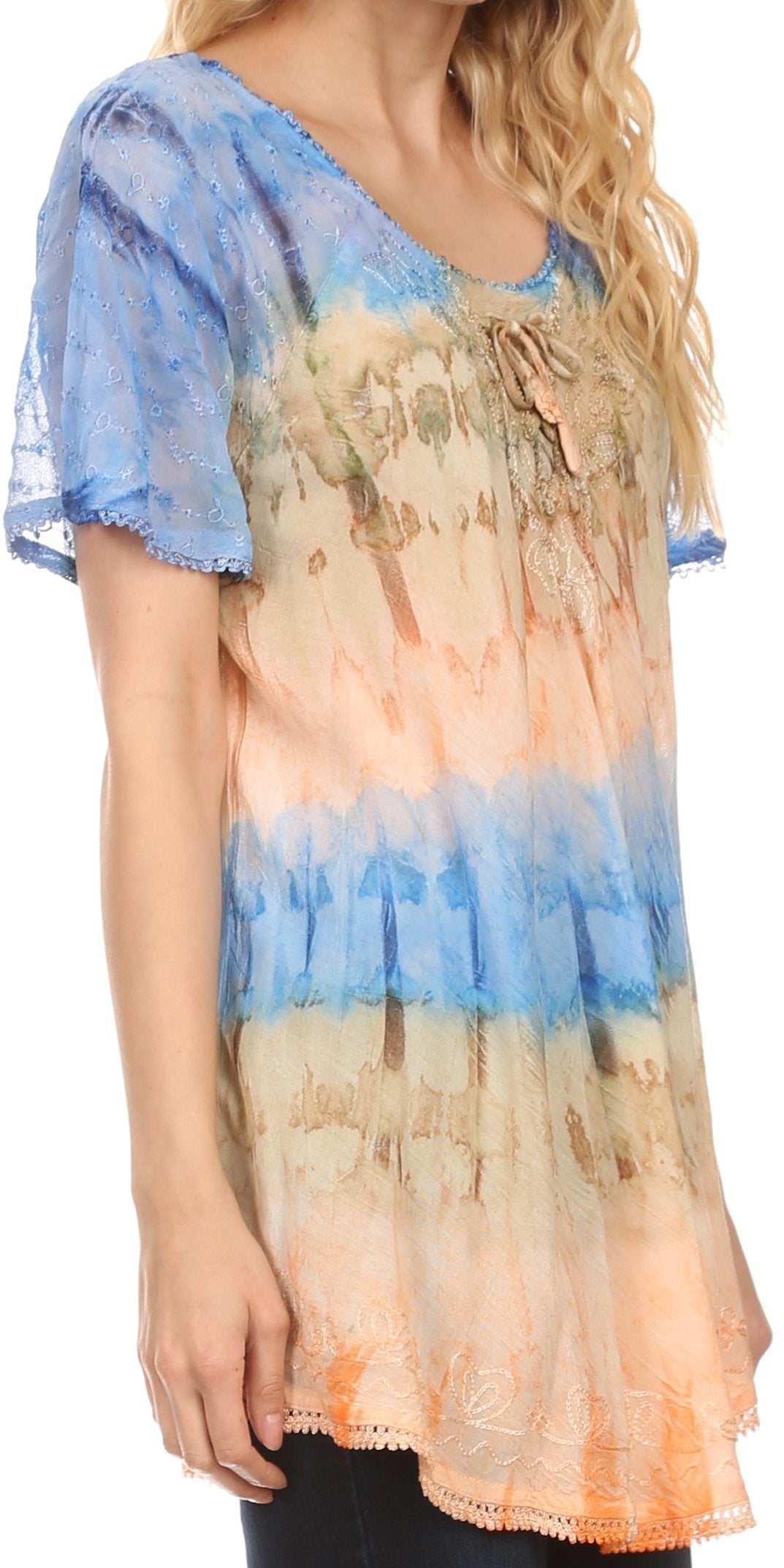 Woman wearing a tie-dye shirt with blue and orange gradient on a white background