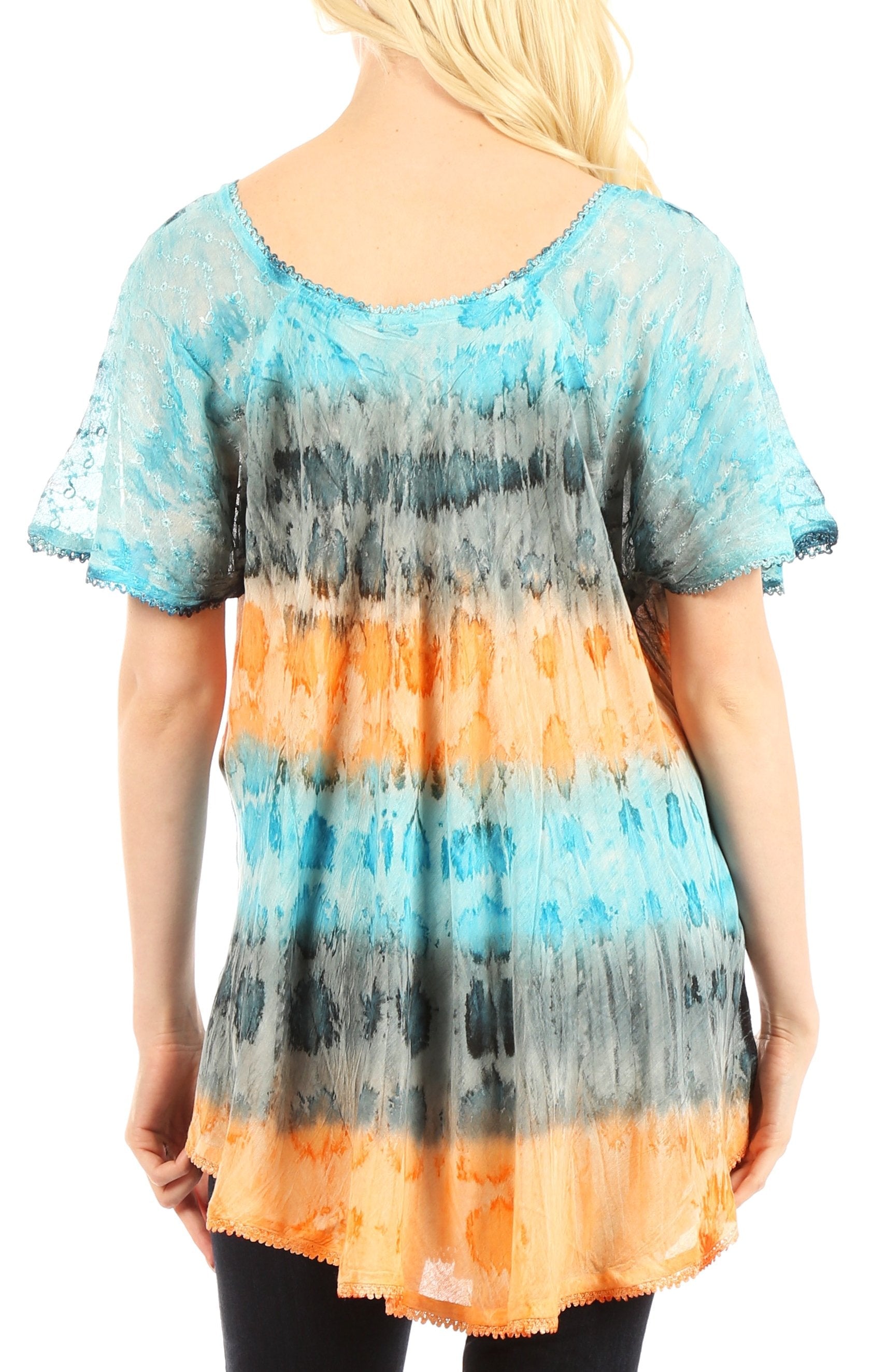 Tie-dye tunic with blue, orange, and gray gradient worn by a person on a white background