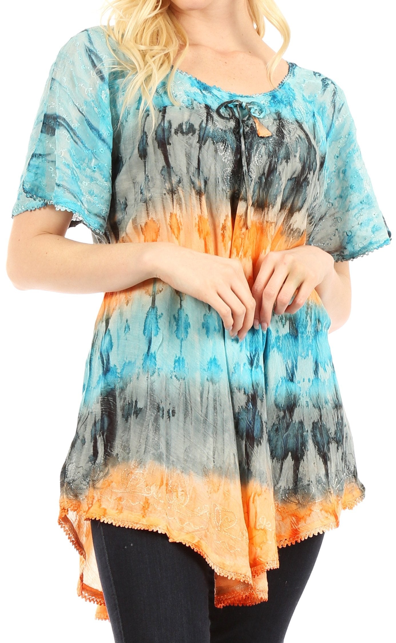 Woman wearing a tie-dye shirt with blue, orange, and black colors on a white background