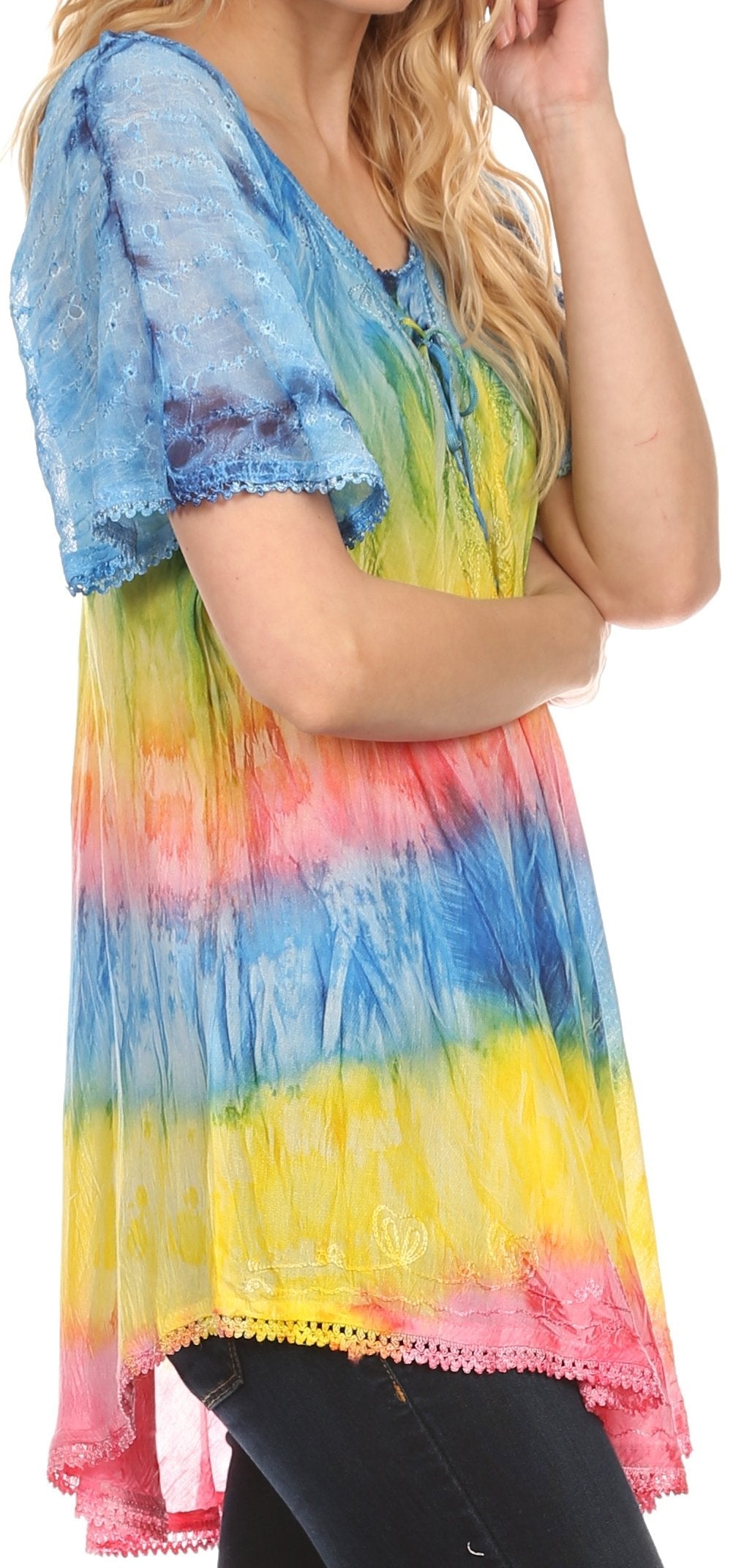 Woman wearing a colorful tie-dye shirt with a white background