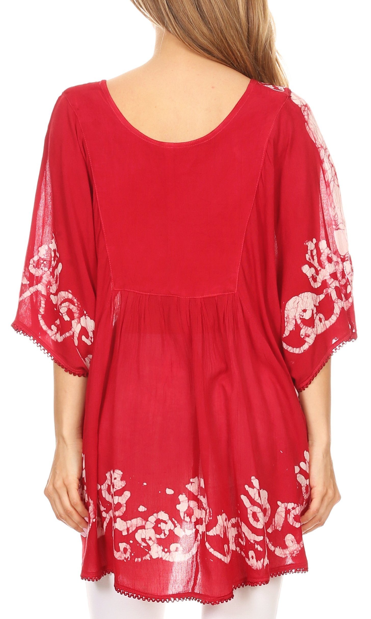 Red dress with white floral patterns on a plain background