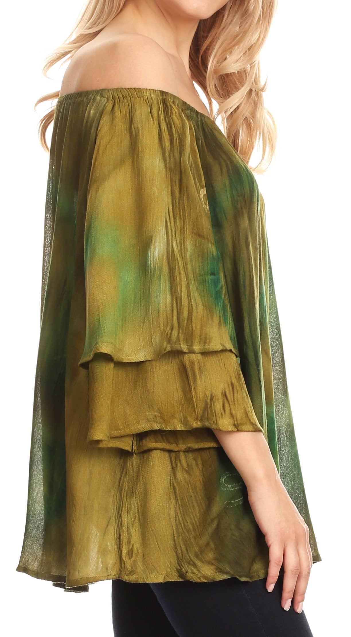 Green and brown layered off-shoulder top worn by a model on a white background