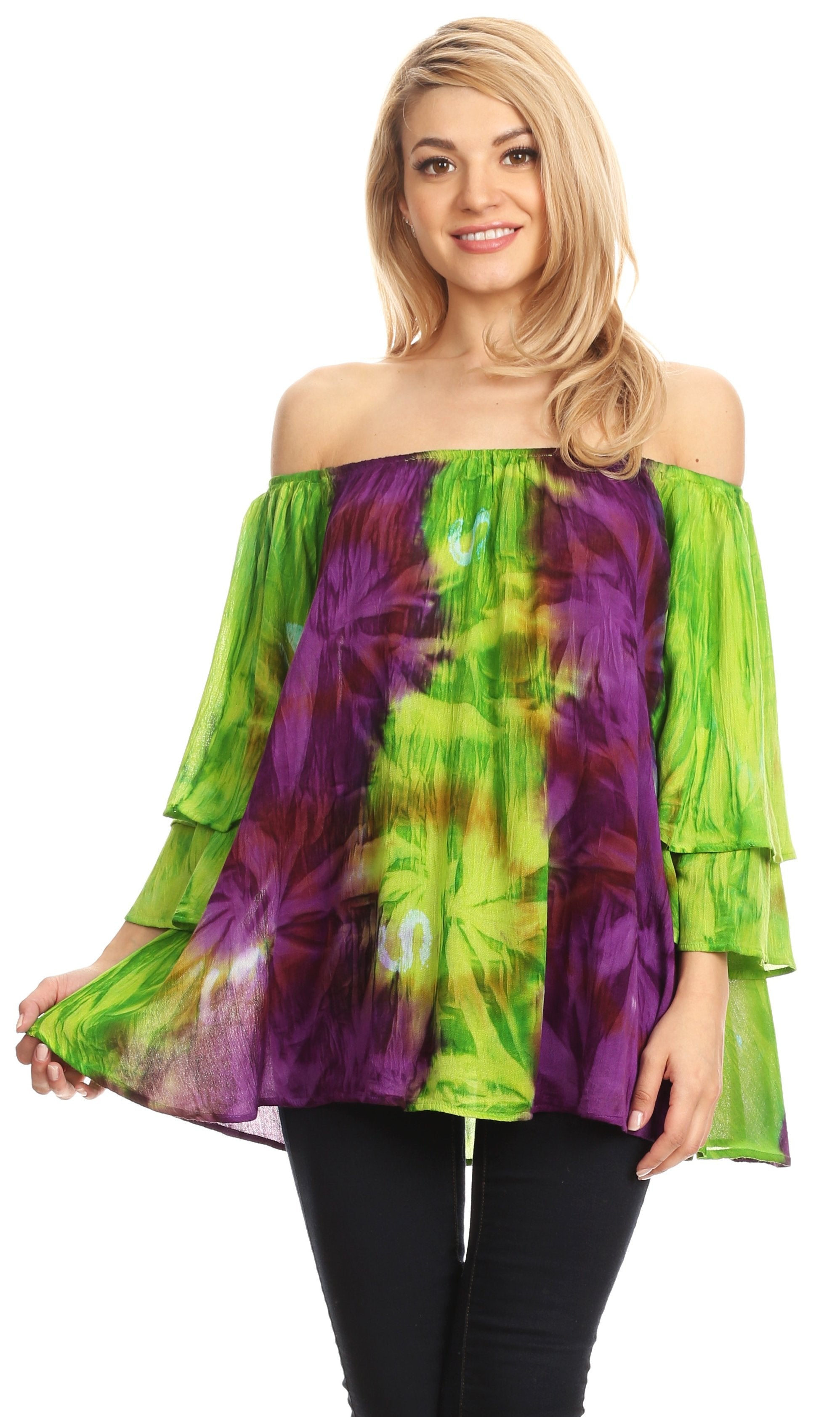 Woman wearing a colorful tie-dye off-shoulder top on a white background