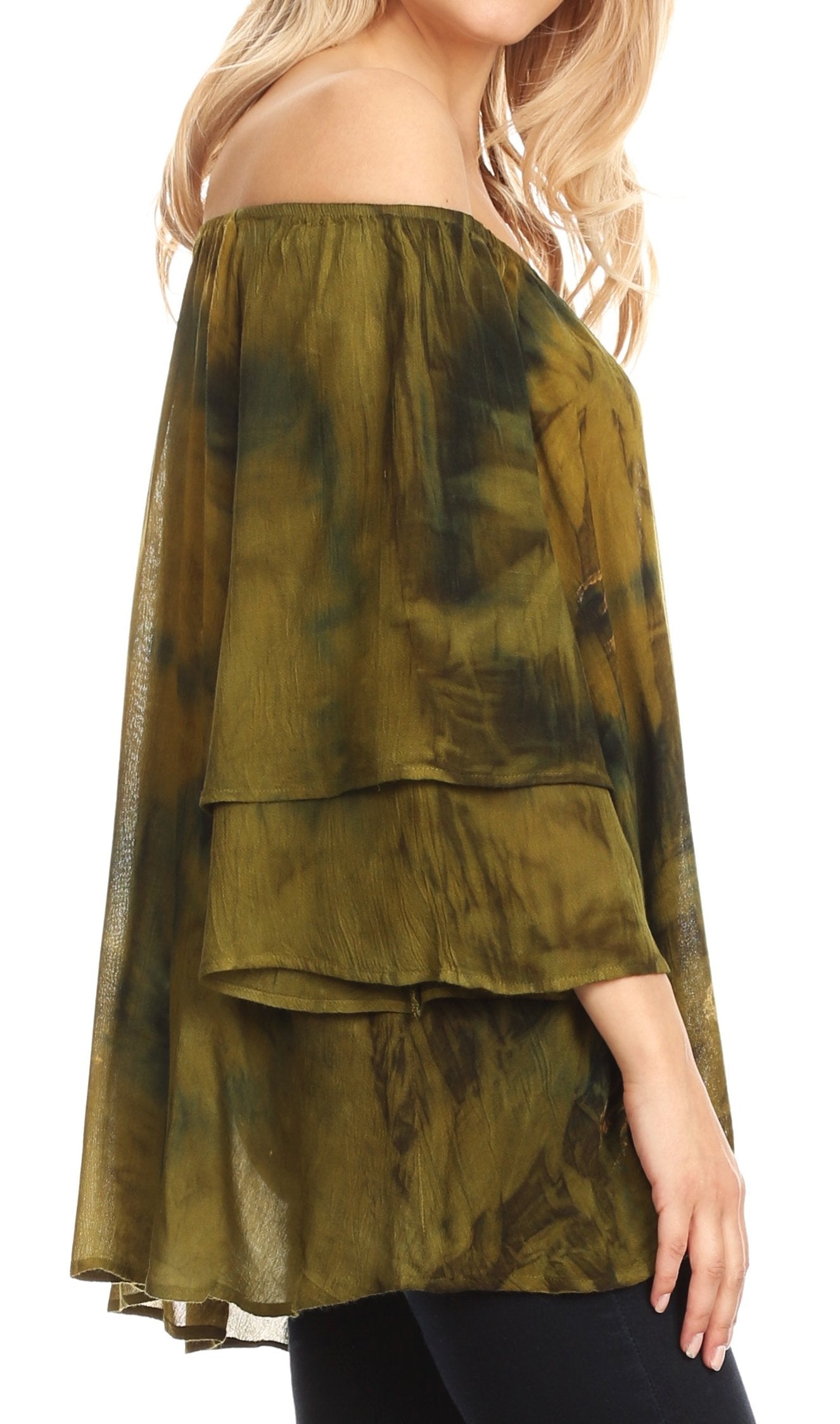 Green tie-dye off-shoulder top worn by a model on a white background