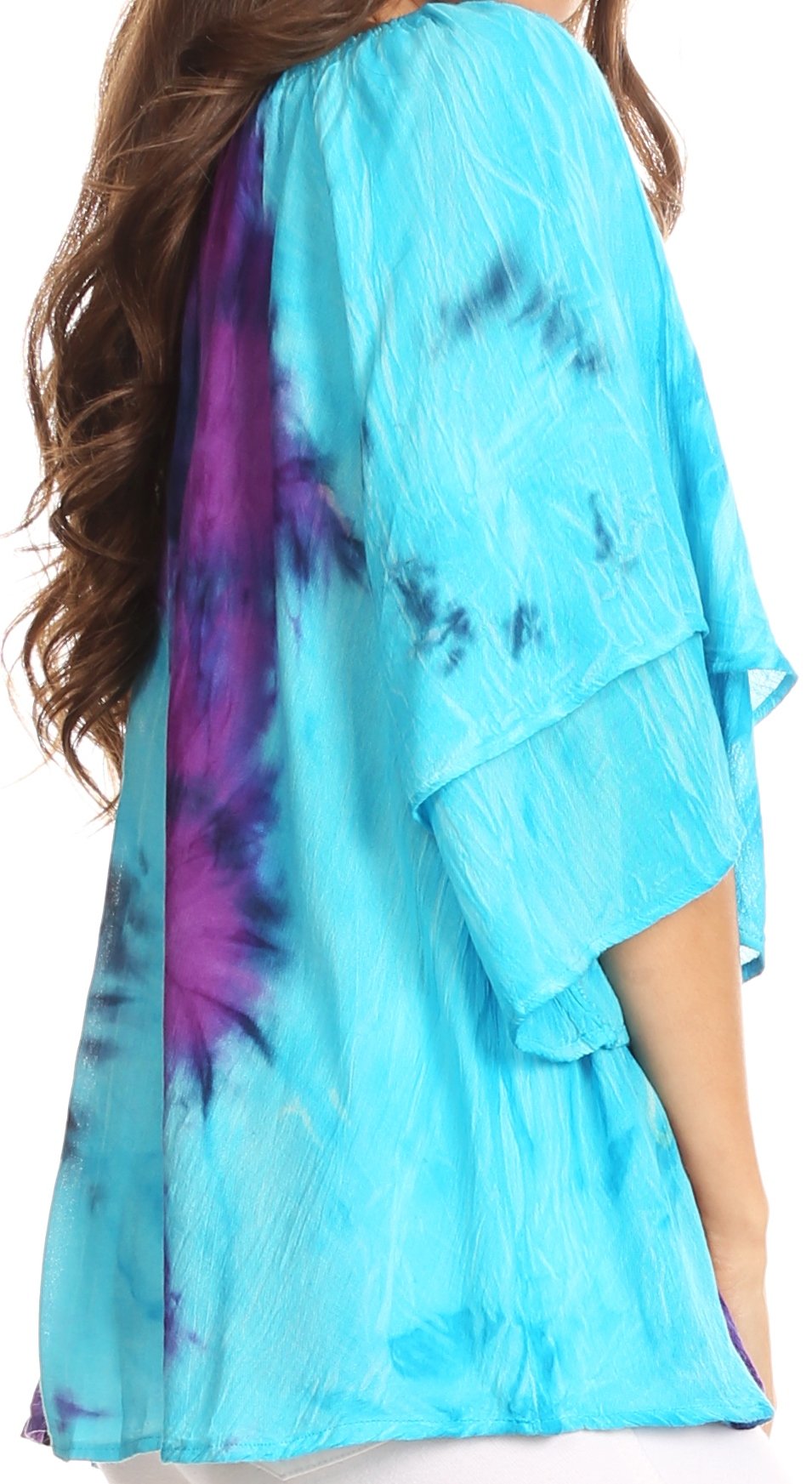 Blue tie-dye shirt worn by a person on a white background