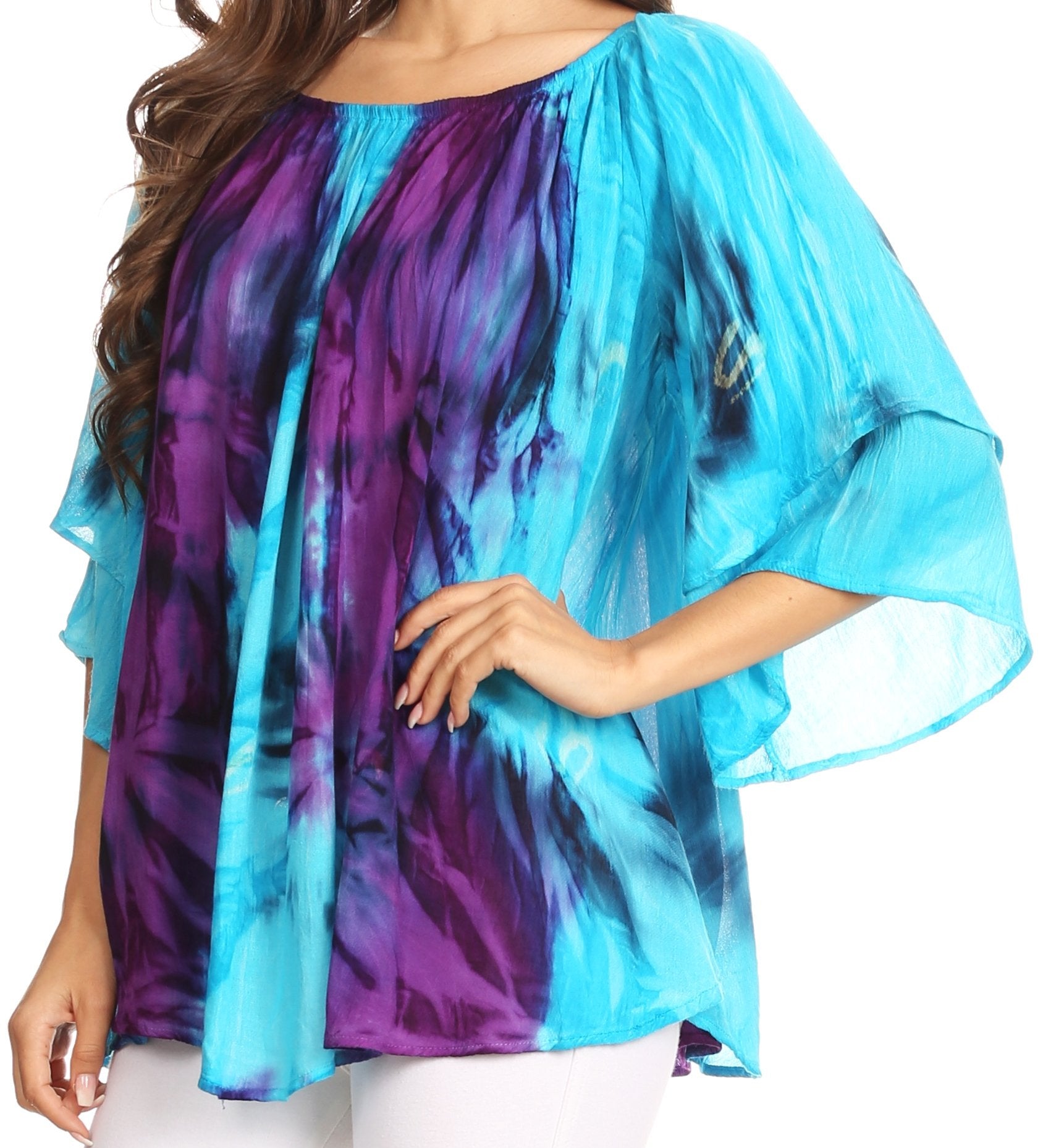 Blue and purple tie-dye top worn by a person on a white background