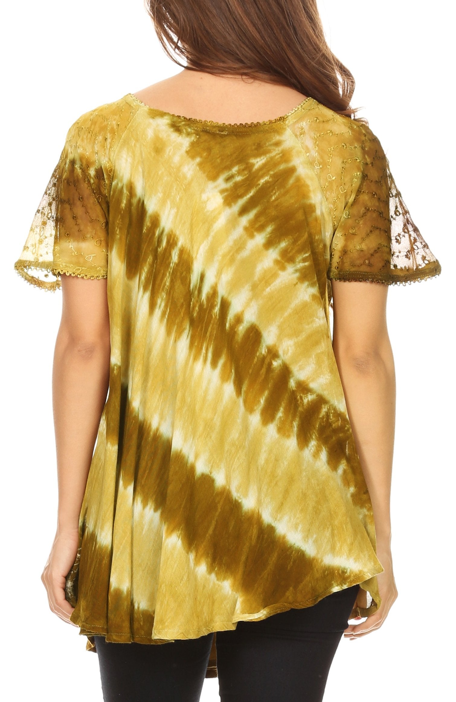 Woman wearing a gold tie-dye top with sheer sleeves on a white background