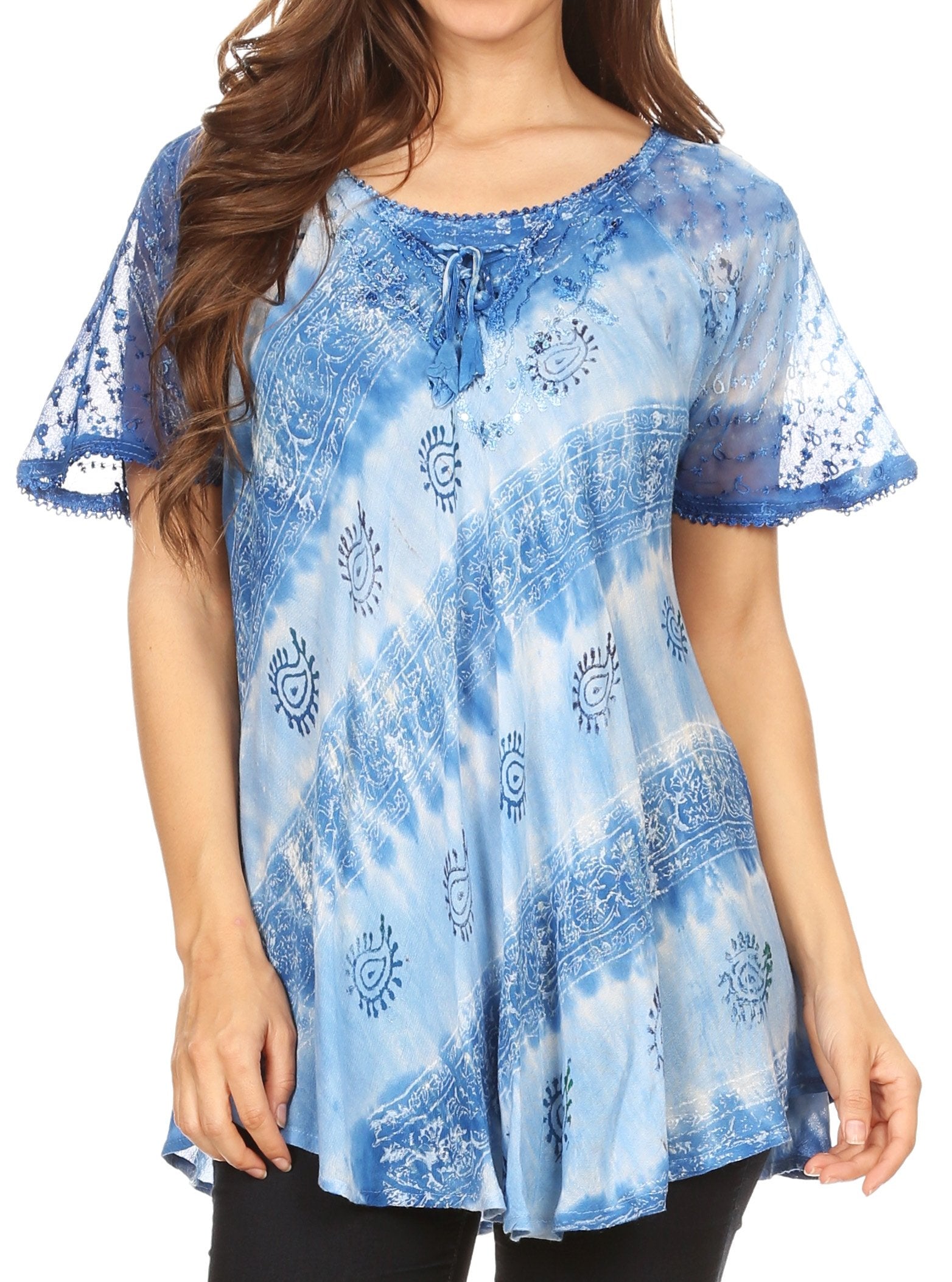 Blue patterned blouse worn by a model on a white background