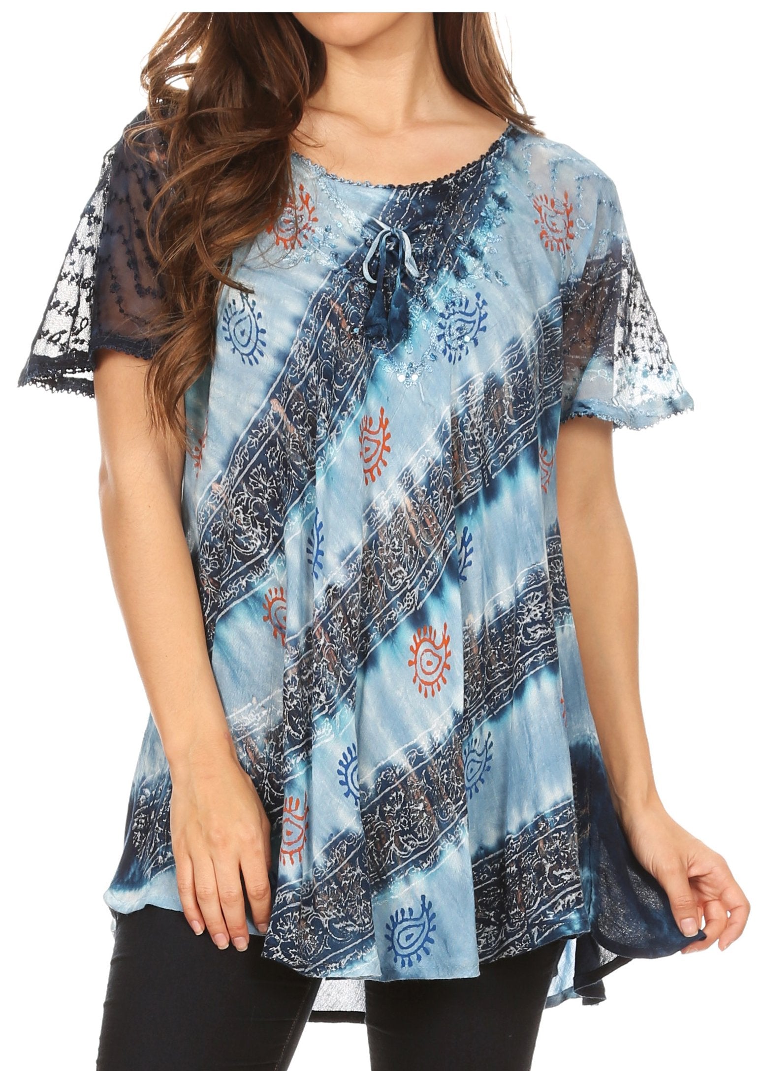 Woman wearing a blue patterned top with lace sleeves on a white background