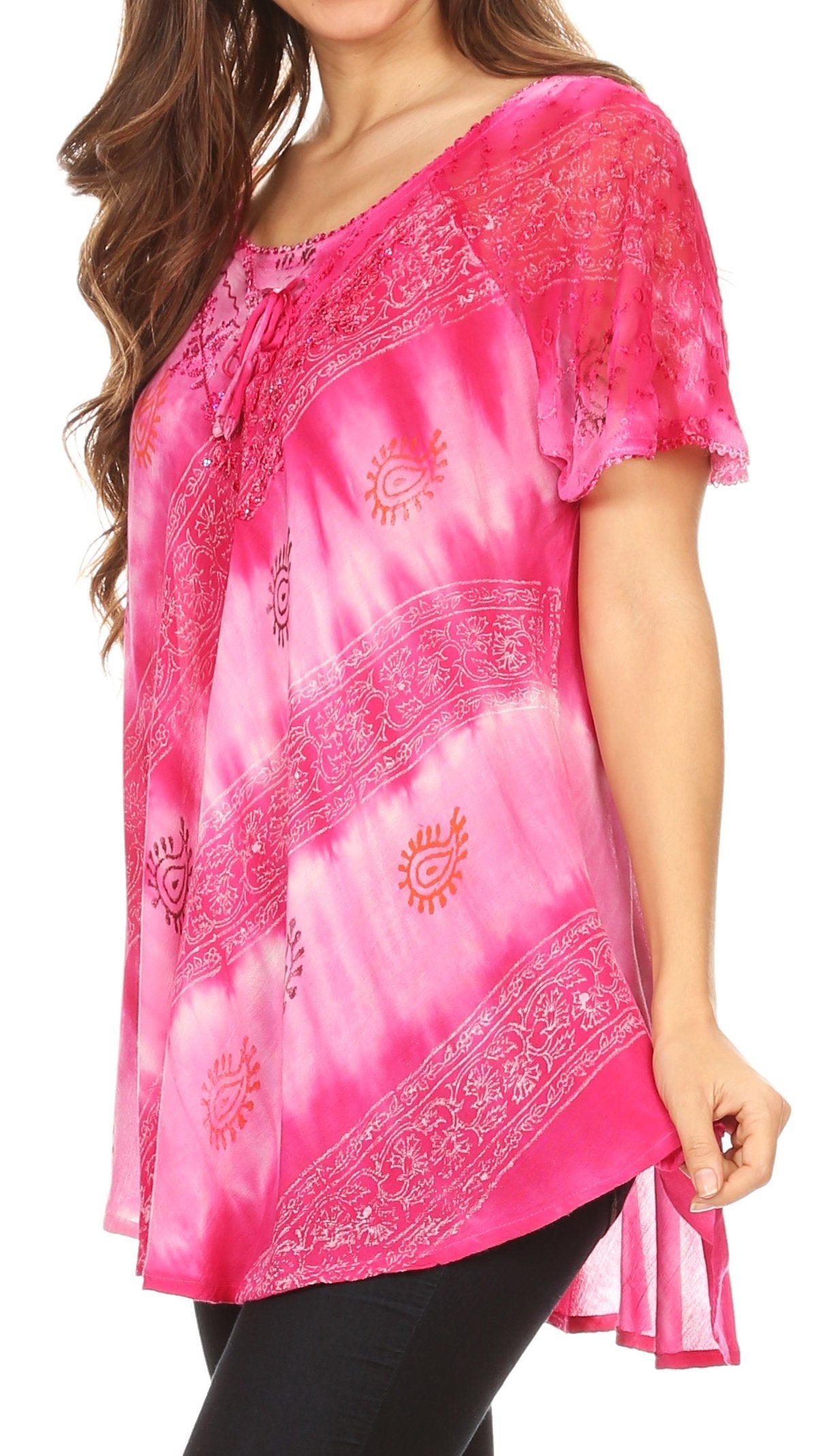 Woman wearing a pink tie-dye blouse with patterns on a white background