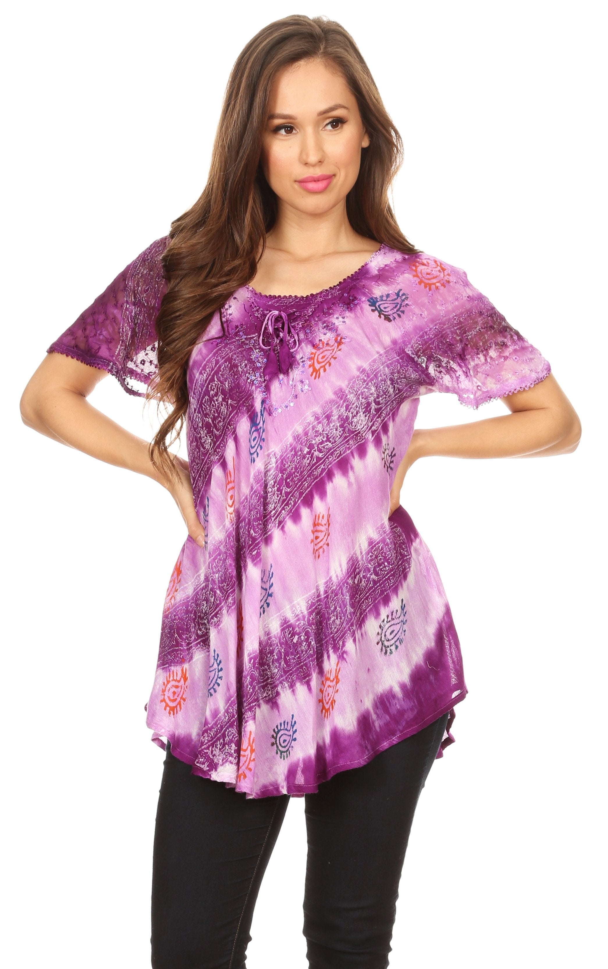Woman wearing a purple tie-dye top on a white background