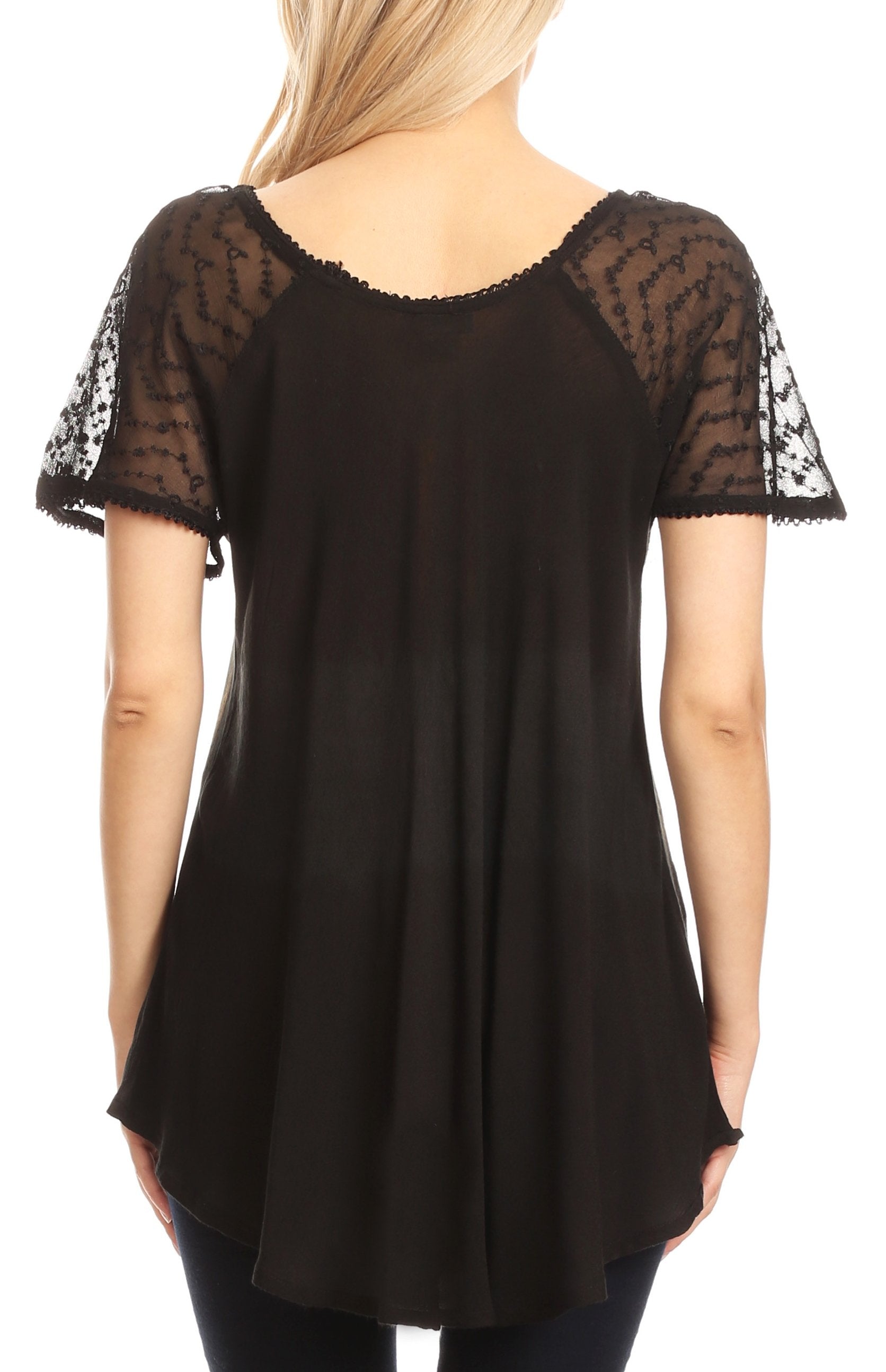 Black tunic with sheer sleeves on a white background