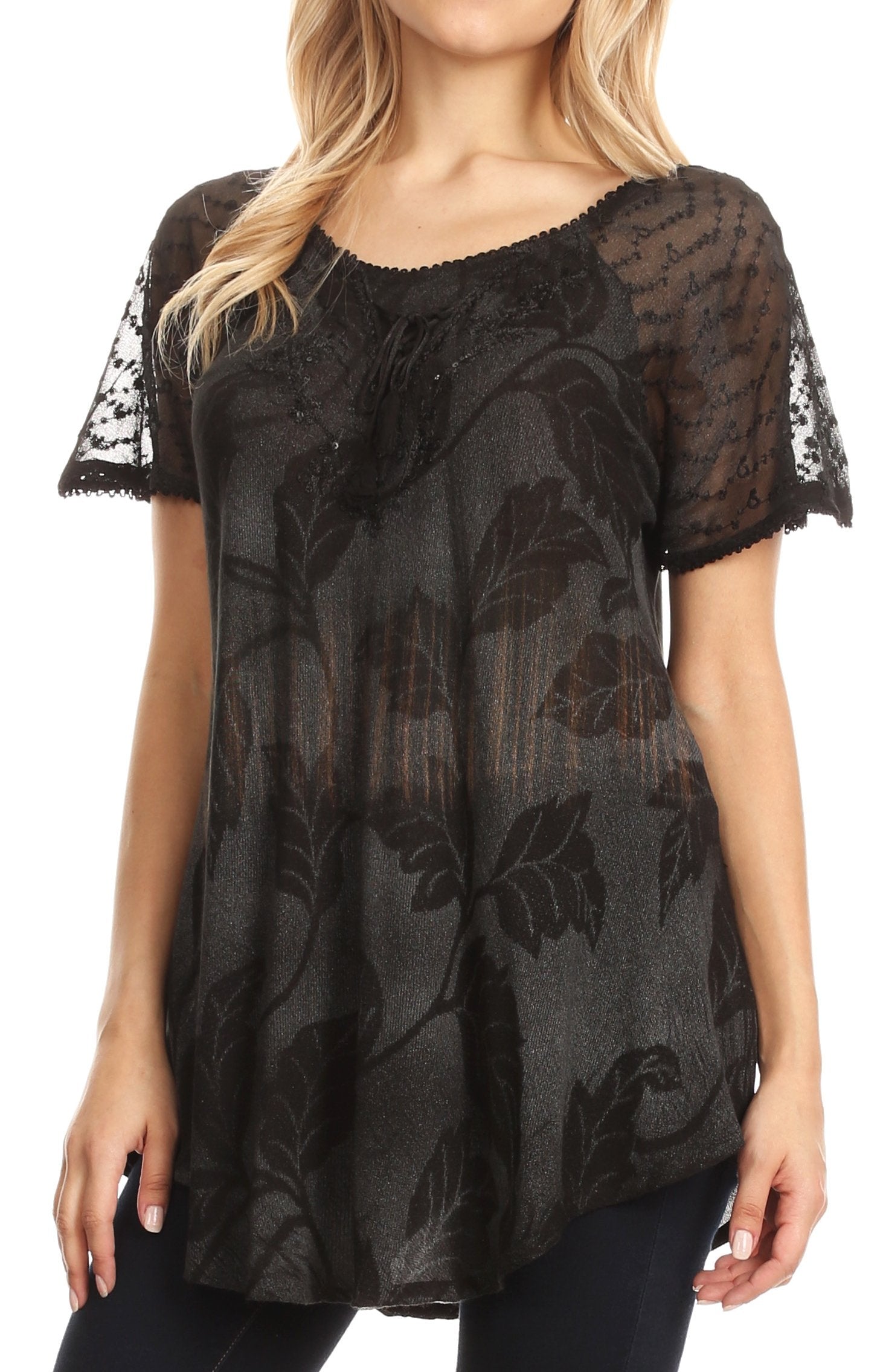 Black floral lace top worn by a model on a white background