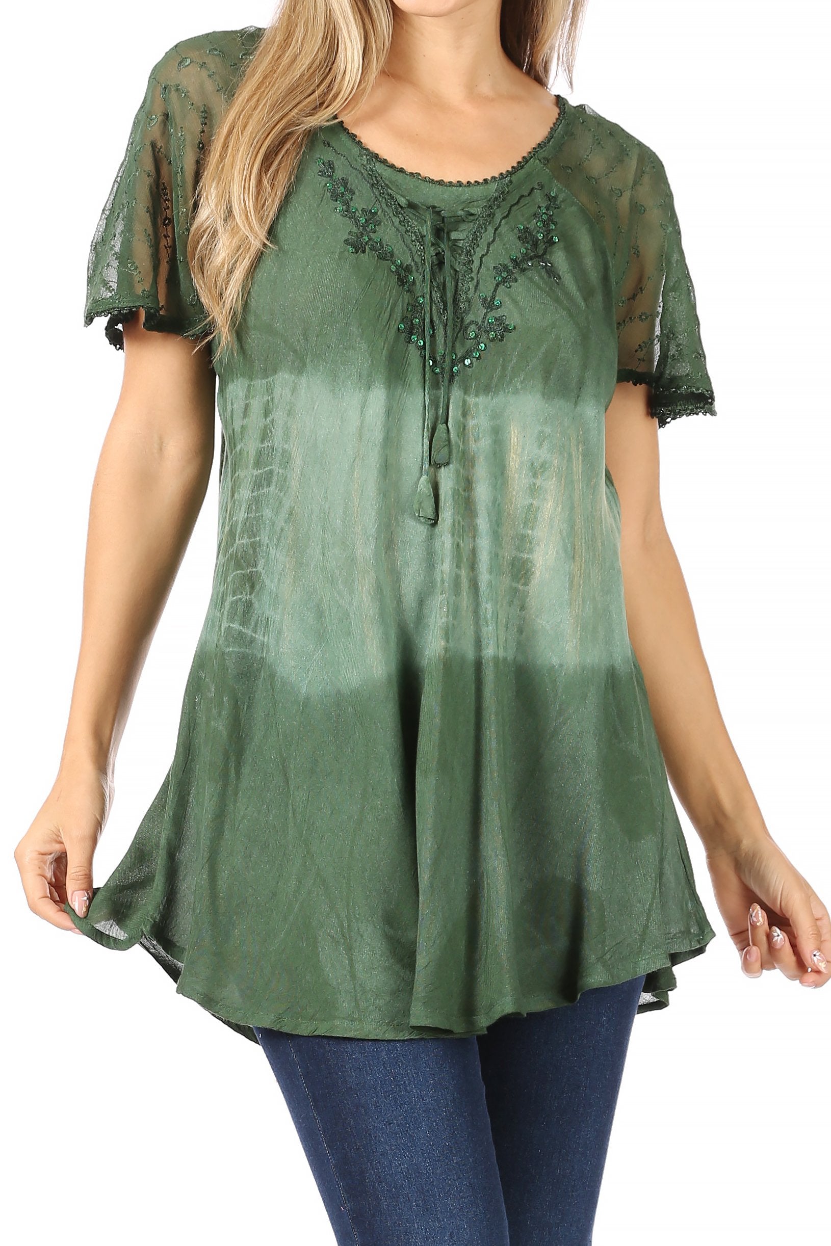 Green lace top worn by a model on a white background