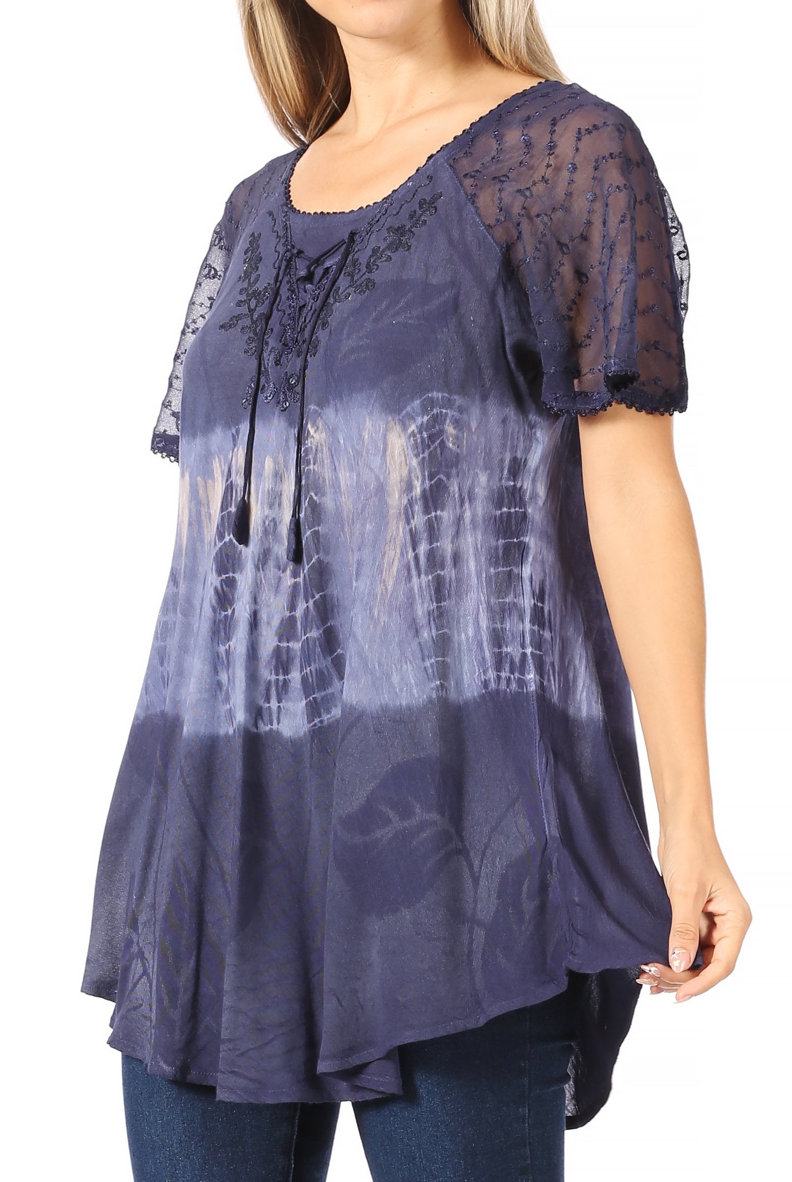 Navy blue lace top with a gradient effect worn by a model on a white background