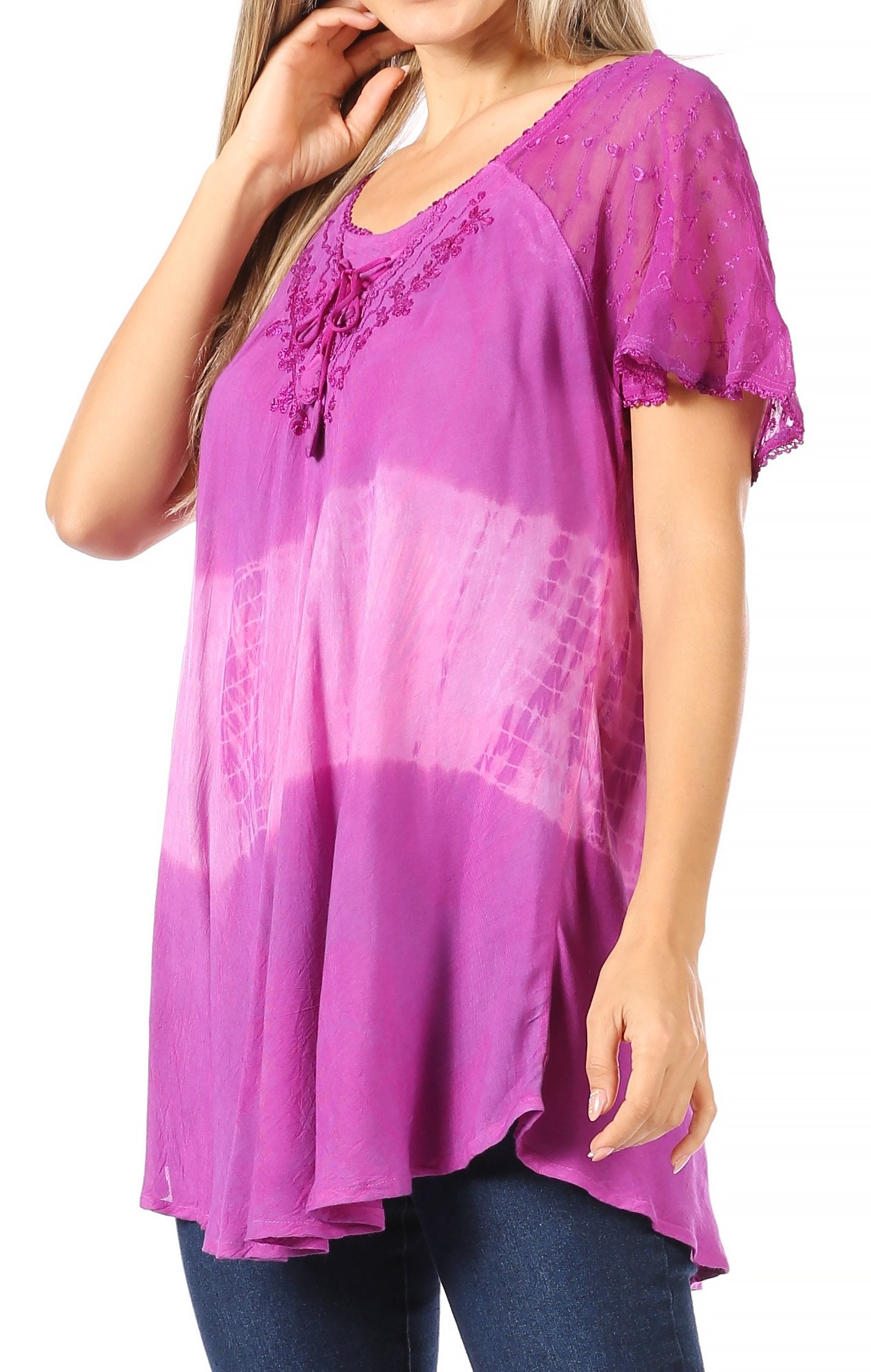 Woman wearing a purple lace top with a gradient effect on a white background