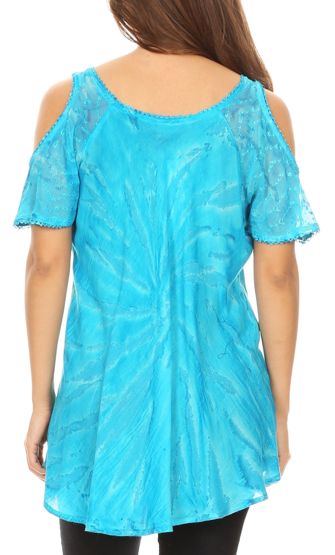 Blue lace top worn by a person on a white background