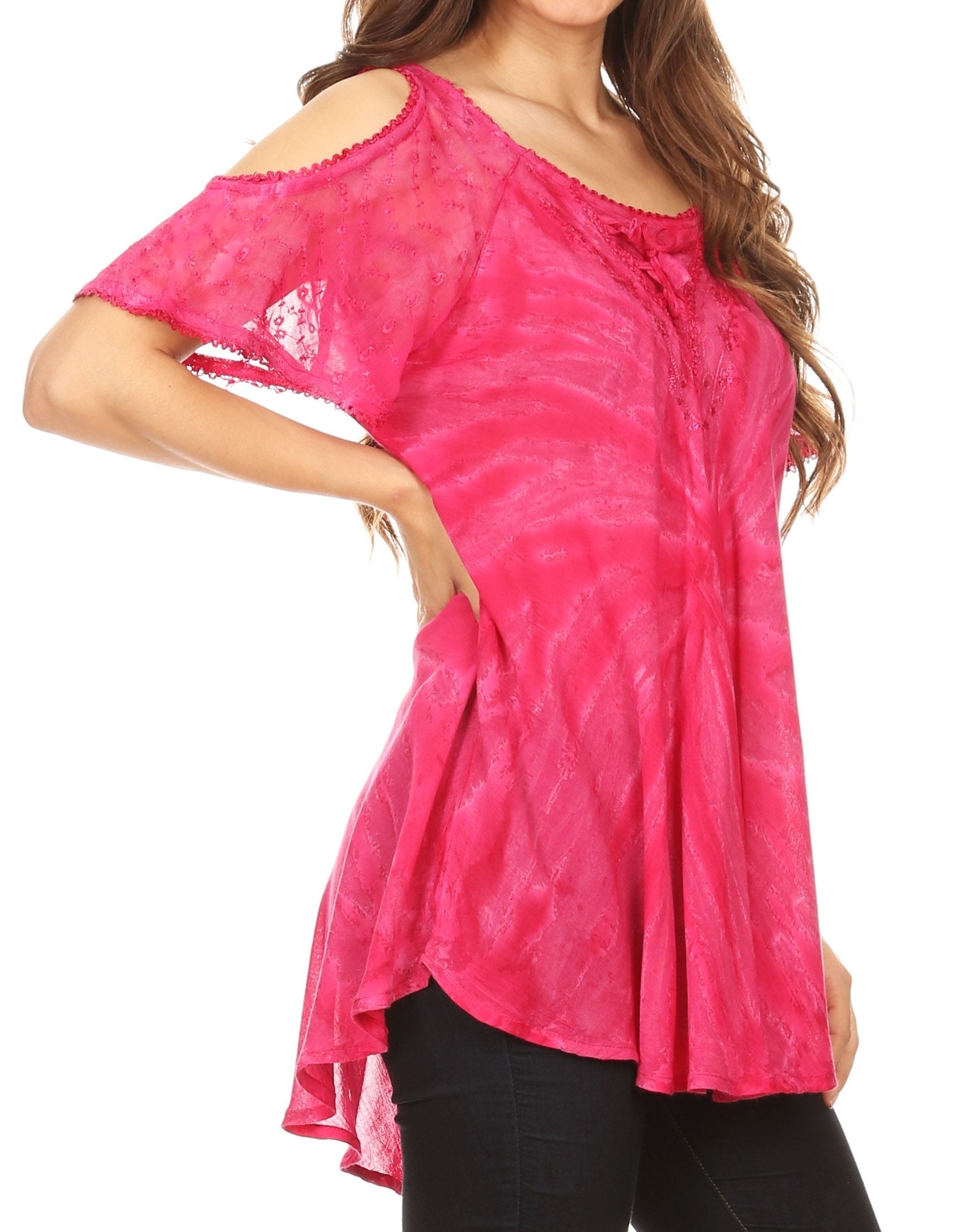 Pink tie-dye off-shoulder top worn by a model on a white background