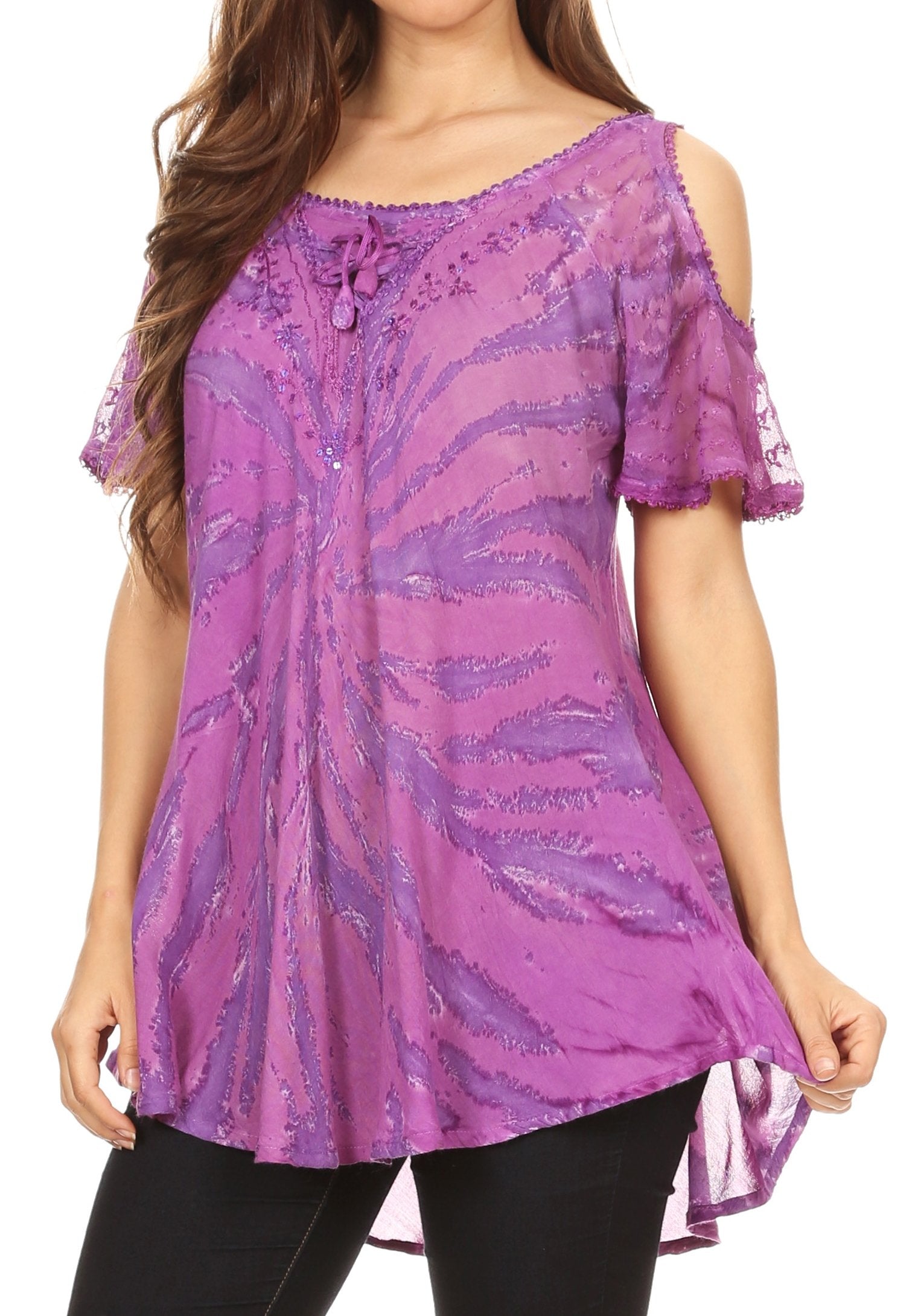 Purple patterned top worn by a model on a white background