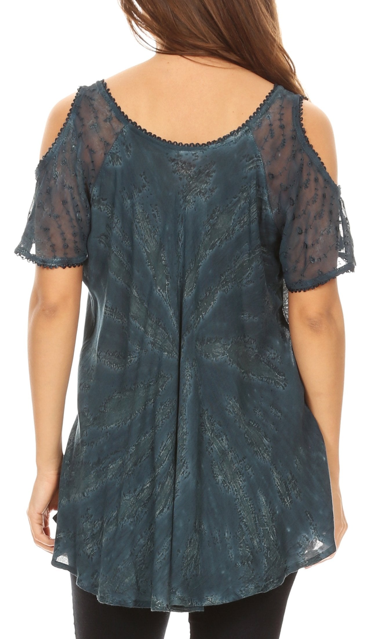 Blue lace top worn by a person on a white background